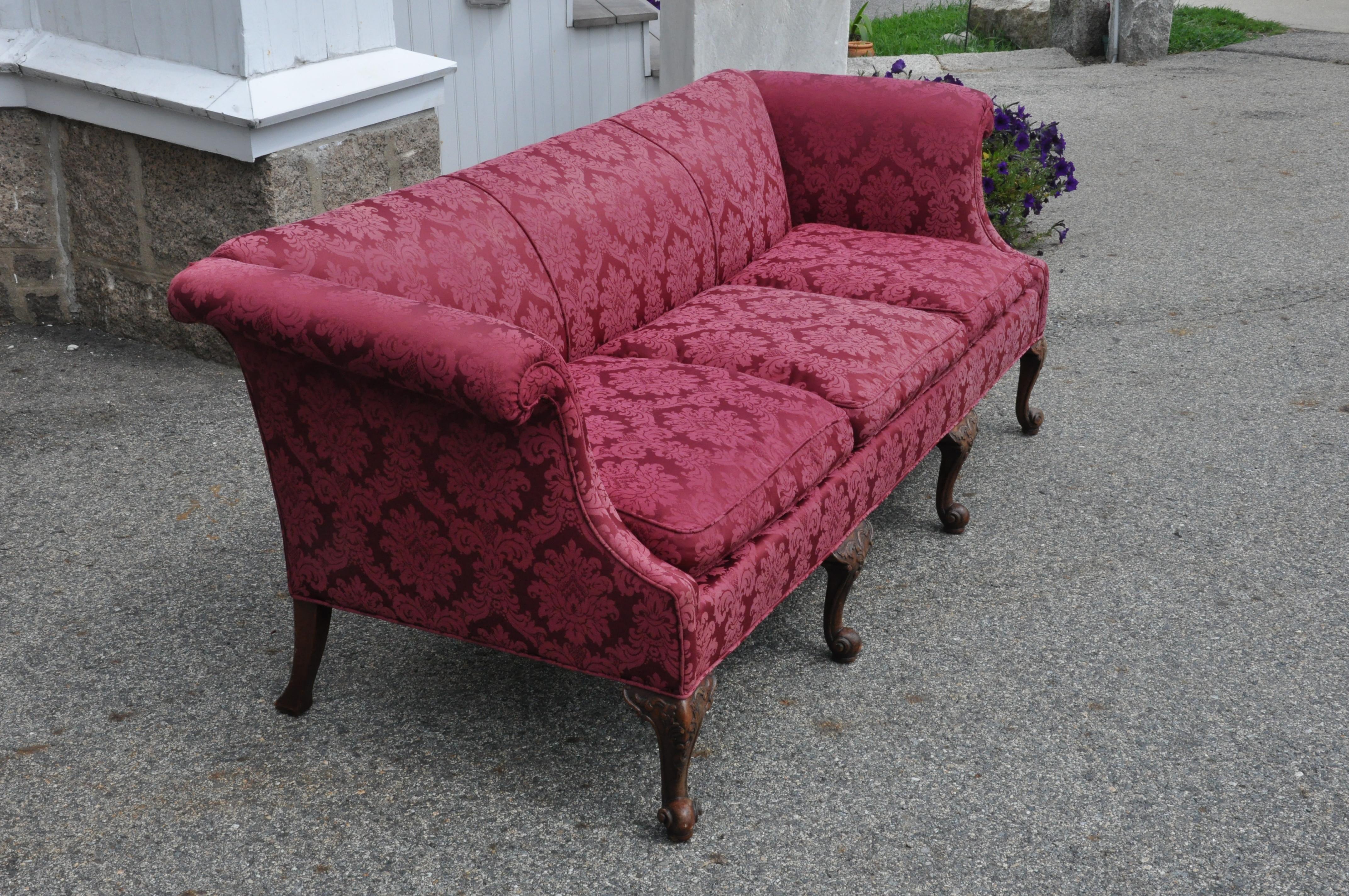 18th century style Irish sofa. Well carved legs and in an Irish square back form. Good walnut legs carved in George II style

Would benefit with a period re-upholstering approach. Fabric is clean and stable but we recommend redo.