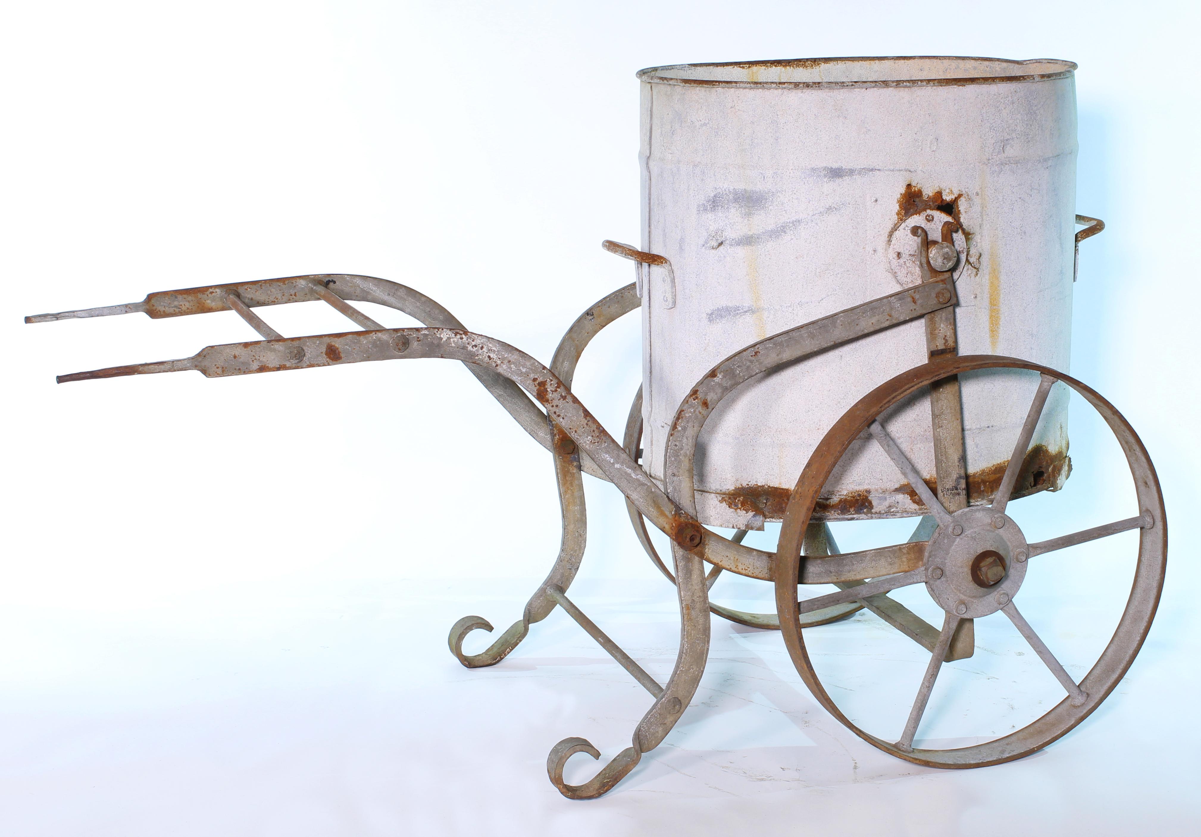 Antique French hand-carved wrought iron and zinc water barrow from the early 20th century would have been used to collect rainwater and then carted around to water the gardens. Measures 60