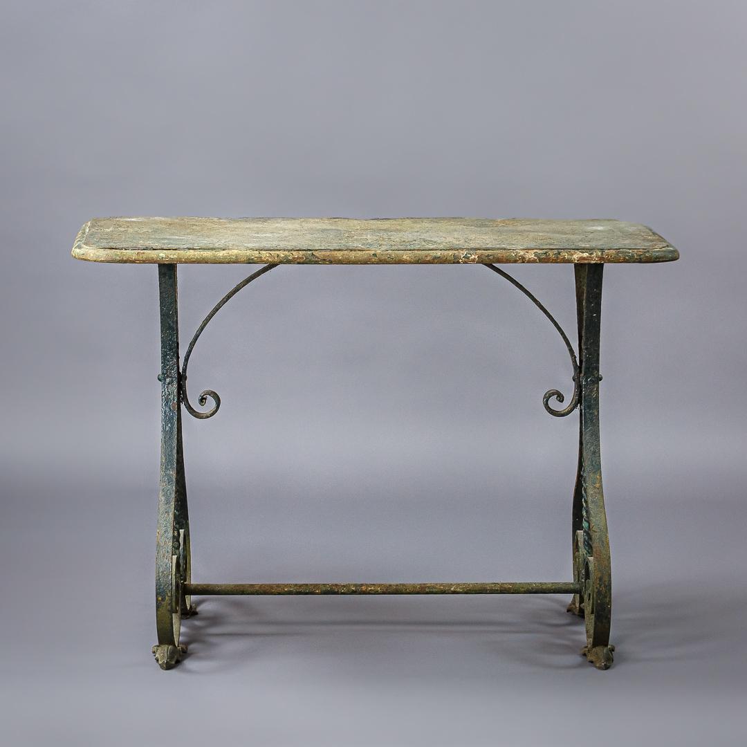 Wonderfully sculptural iron garden or conservatory table. Great patination to the surface. Some minor losses.