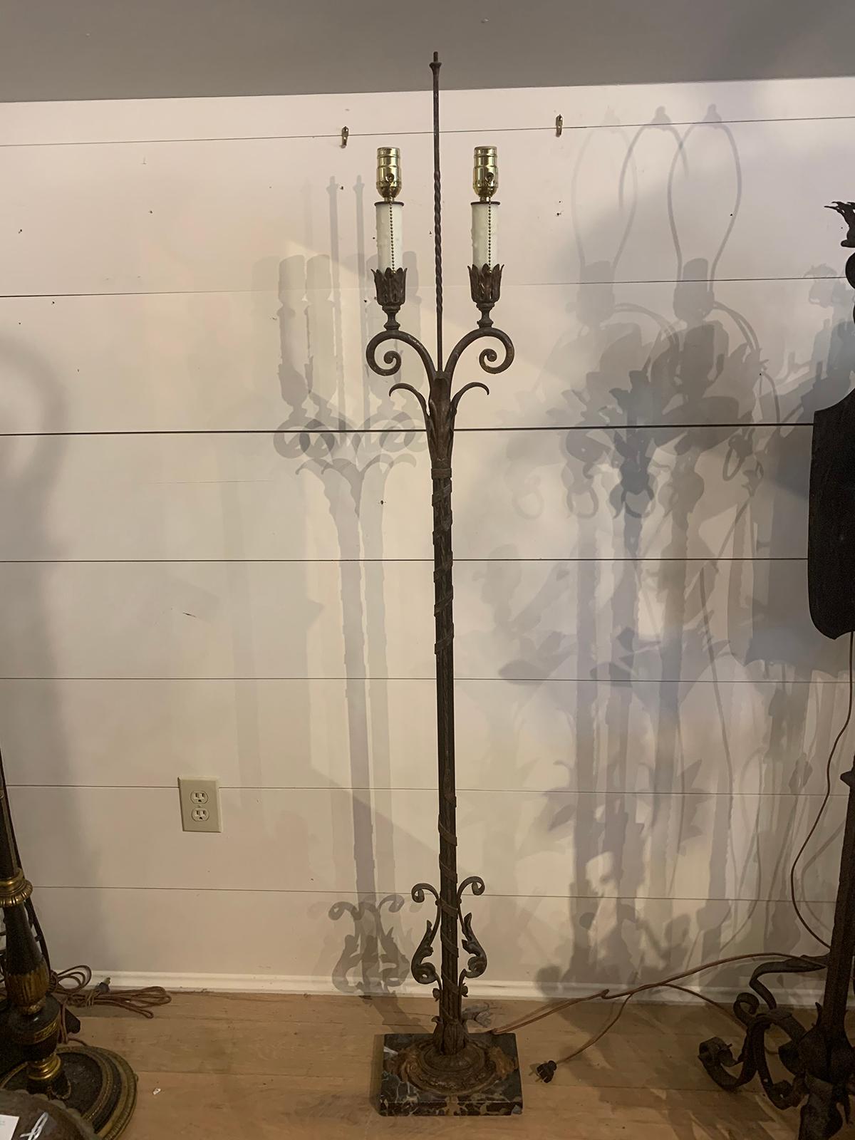 Early 20th century iron and marble two-arm floor lamp
Measures: Overall: 10