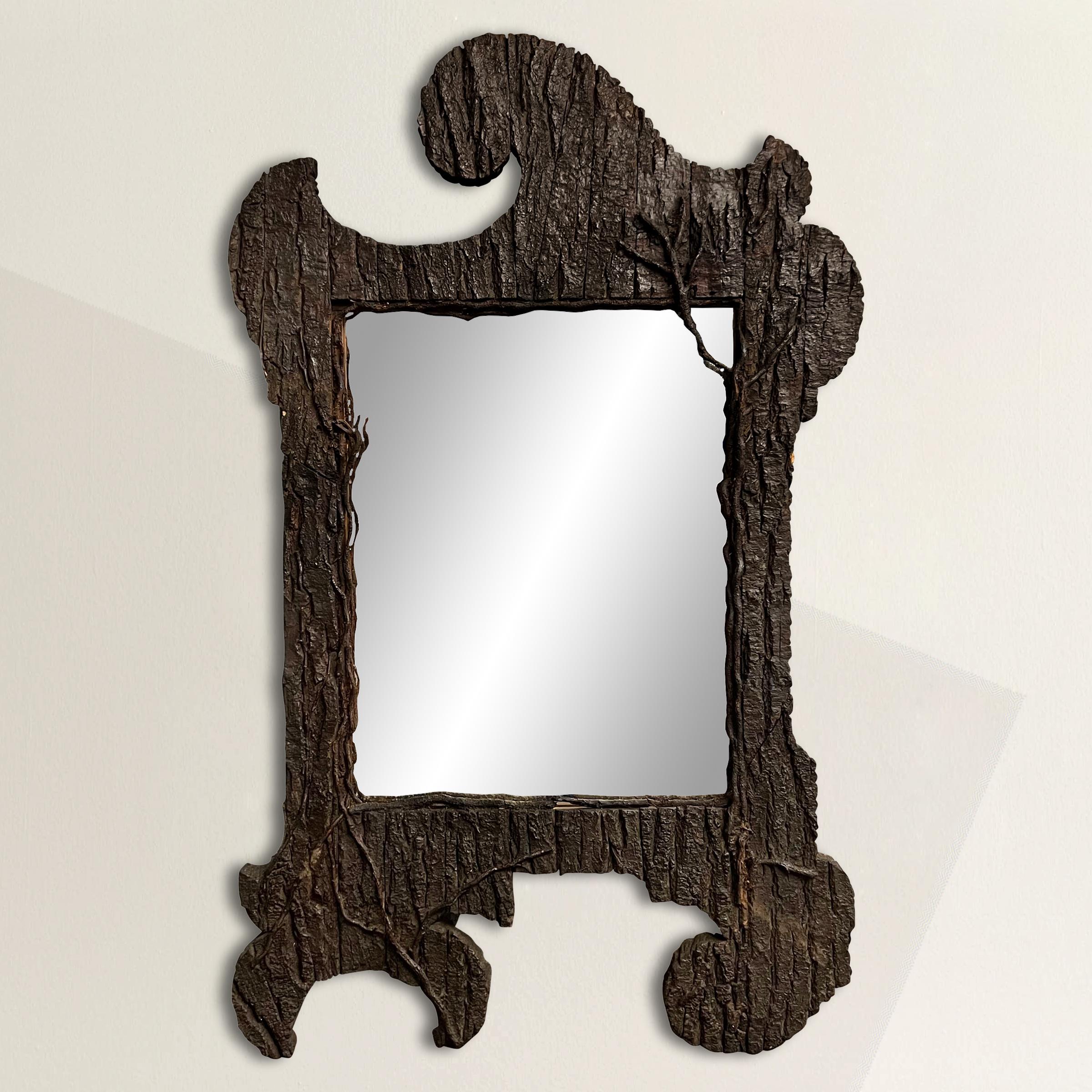 This exquisite early 20th-century Italian bark framed mirror embodies the charm and elegance of a bygone era. Custom made for a Tyrolean ski chalet in 1907, it exudes a rustic yet refined aesthetic that seamlessly blends into any style interior. The