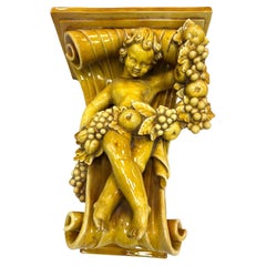 Early 20th Century Italian Baroque Revival Glazed Majolica Cherub Wall Bracket