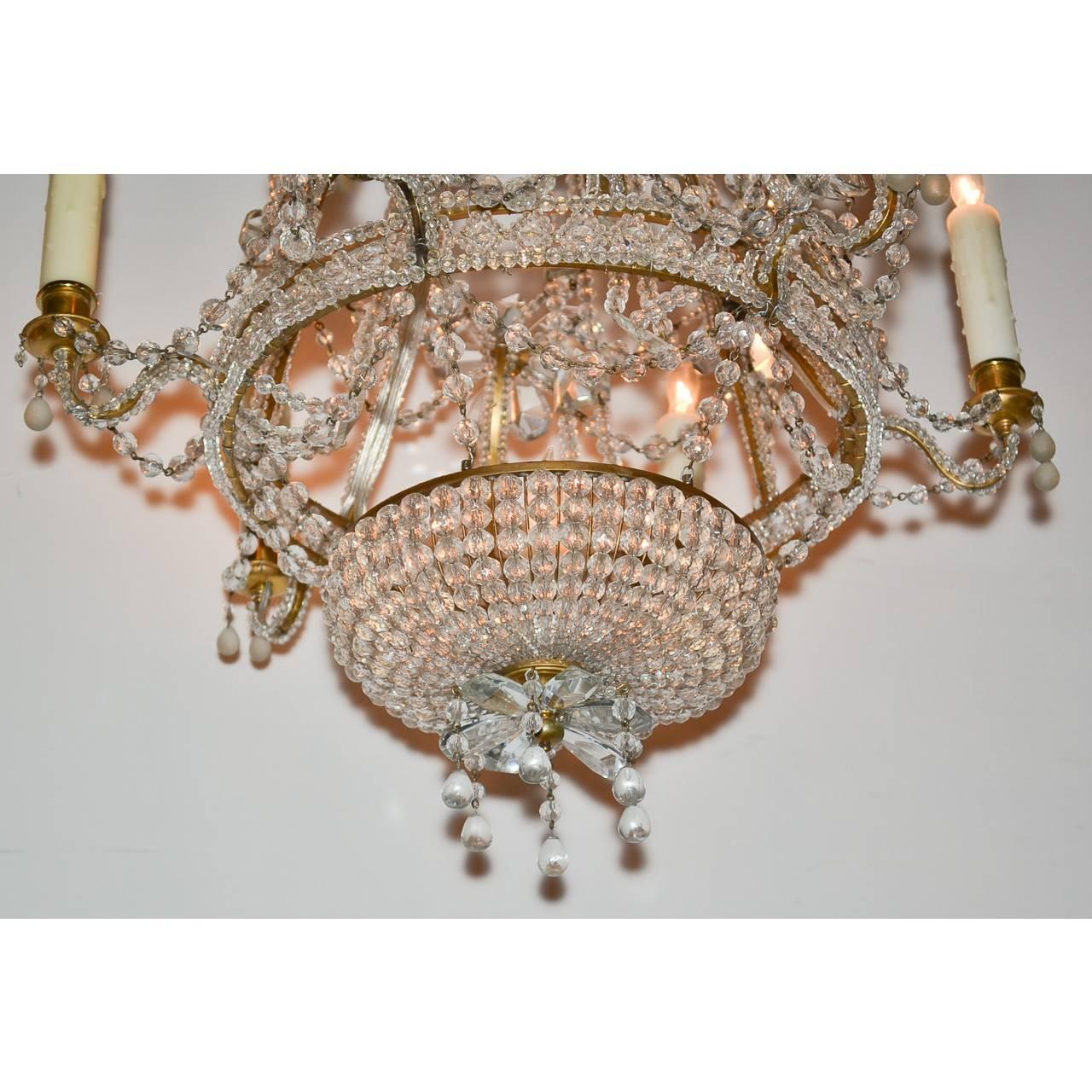 Pretty Italian six light beaded chandelier with gold accents for that perfect spot in your home. Unique design.
Made in Italy, circa 1920.
We will supply three feet of chain and a canopy.
Measures: 18 inches wide x 25 inches height.