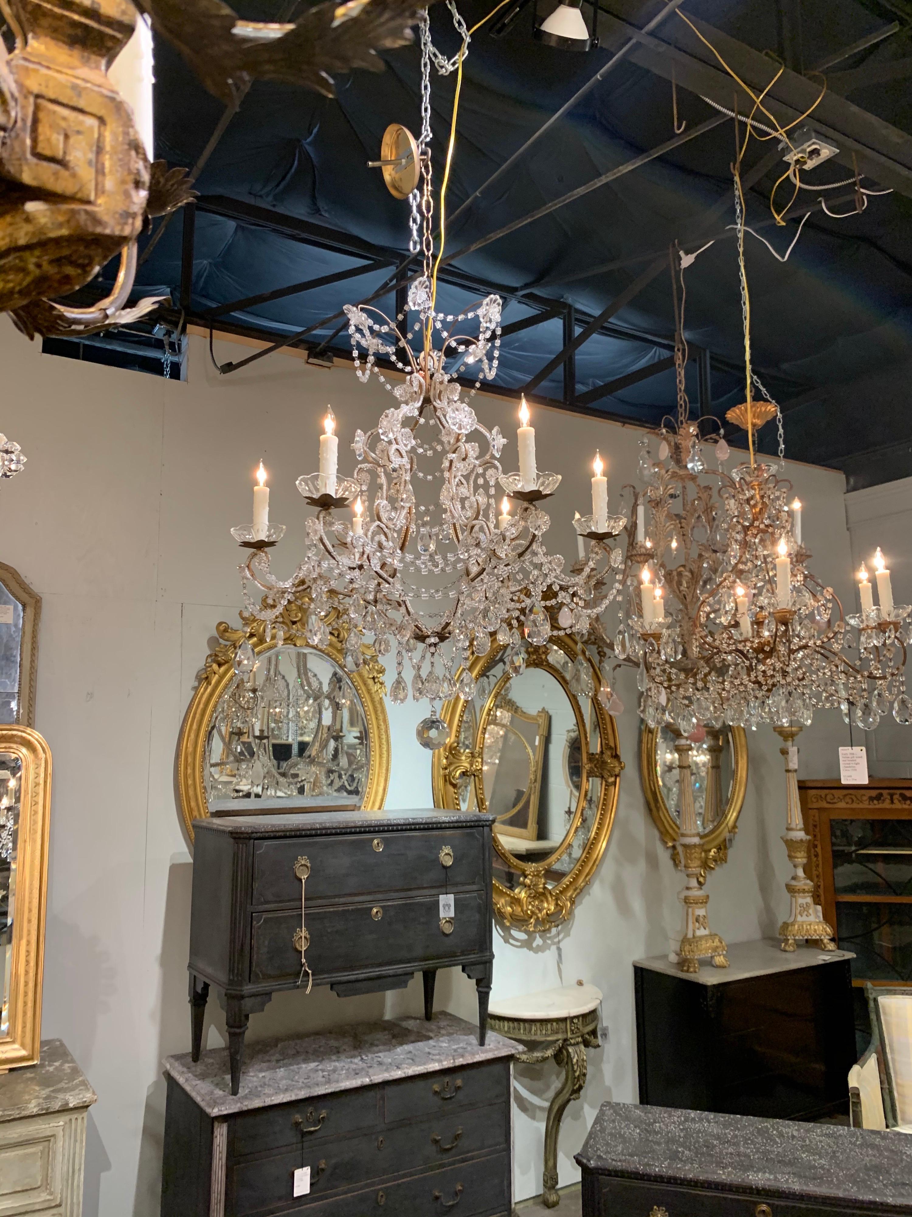 Lovely early 20th century Italian beaded crystal chandelier with 6 lights. Featuring a beautiful beaded base, along with an array of gorgeous crystals and flowers. So pretty!