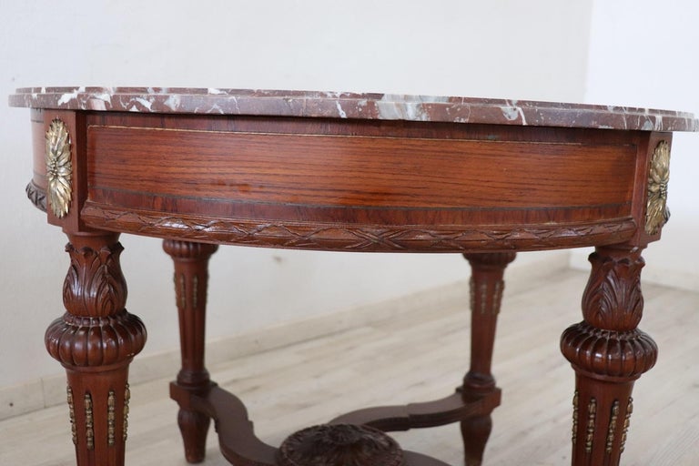 Early 20th Century Italian Carved Walnut Round Center Table with Red Marble Top For Sale 1