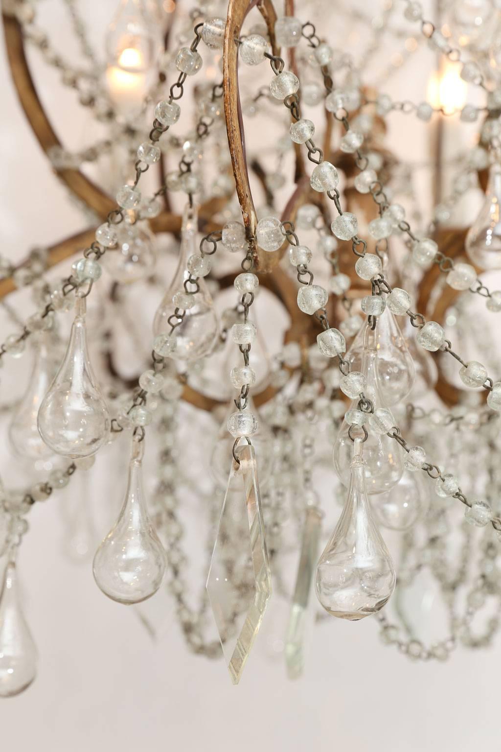 Italian Chandelier in Wood, Gilt-Iron and Glass In Fair Condition For Sale In Houston, TX