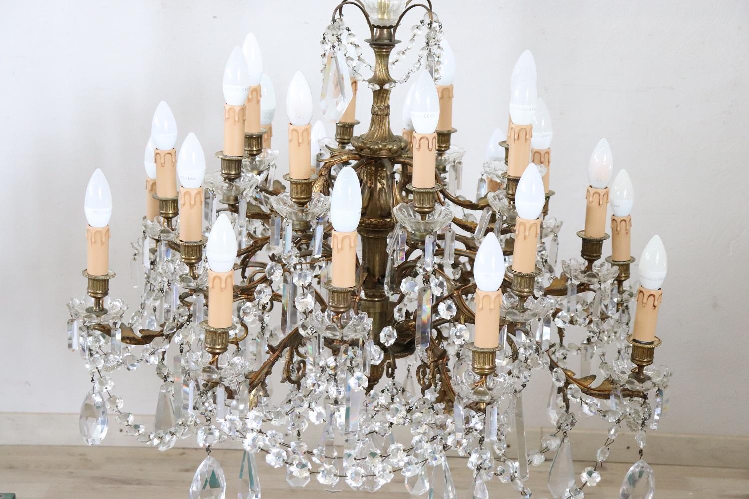 Mid-20th Century Early 20th Century Italian Gilded Bronze and Crystal Large Chandelier, 24 Bulbs For Sale