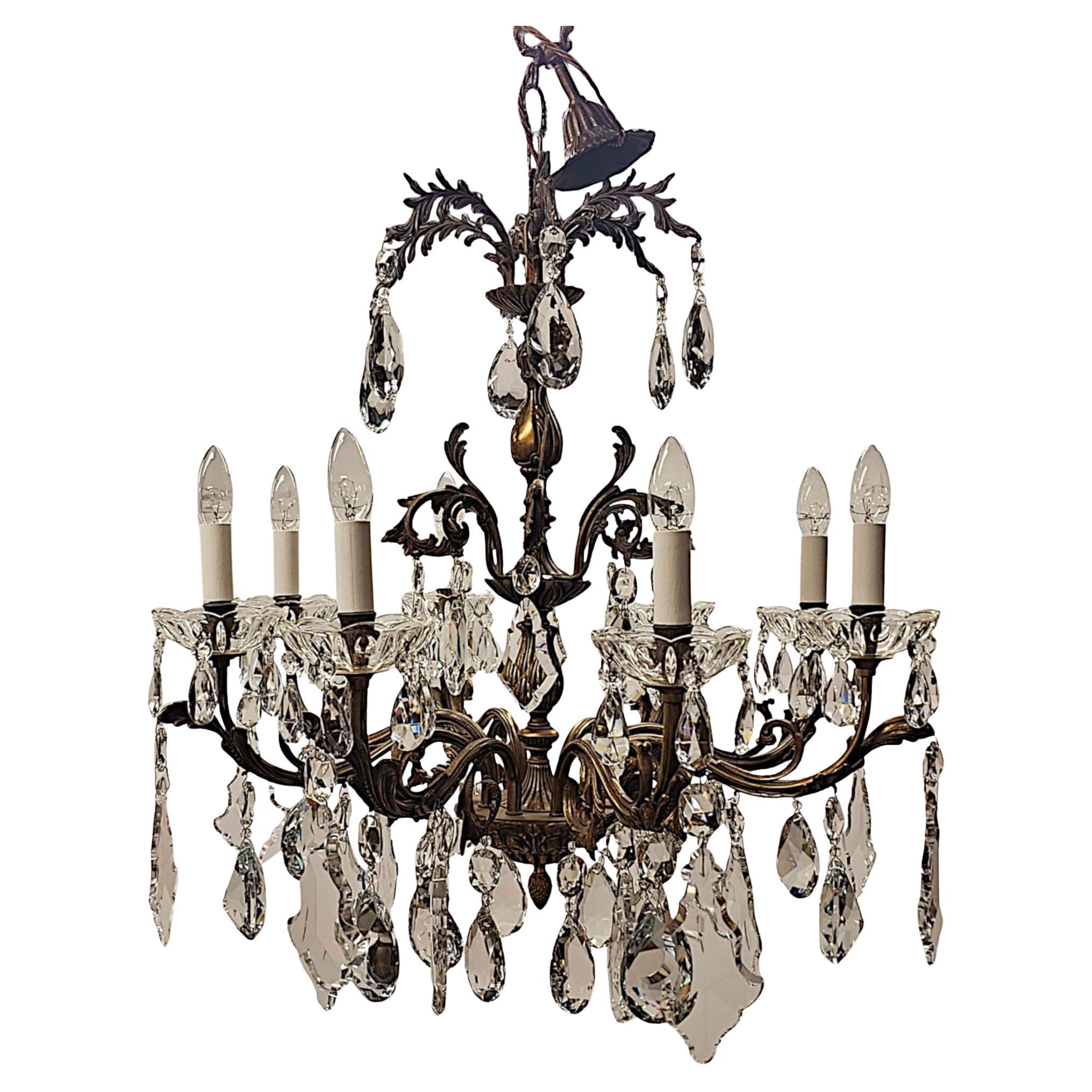 Lampadario a otto rami in bronzo dorato e cristallo dei primi del Novecento italiano in vendita