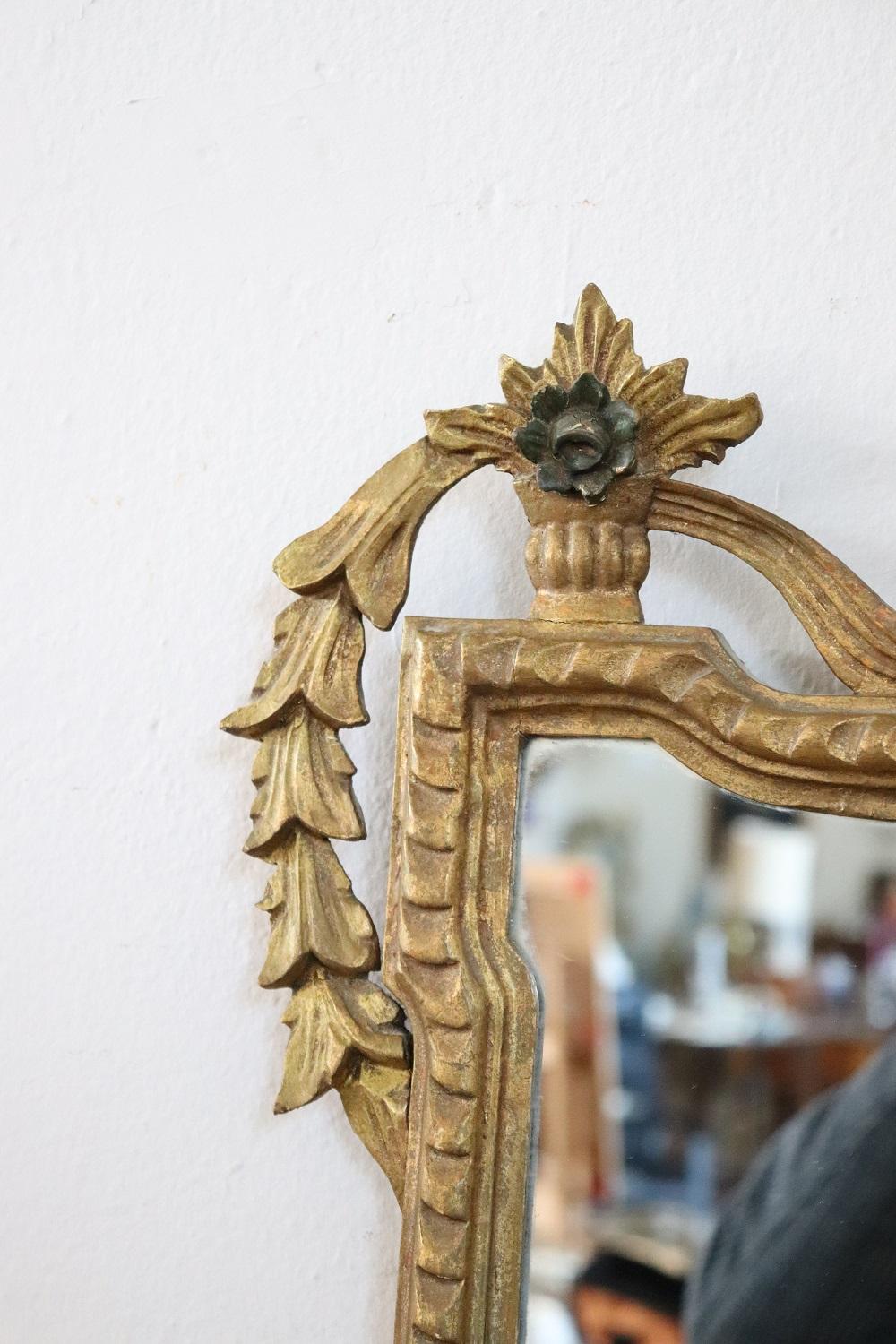 Early 20th Century Italian Louis XVI Style Carved and Gilded Wood Wall Mirror In Good Condition For Sale In Casale Monferrato, IT
