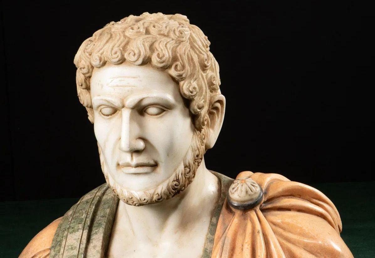 A striking early 20th-century bust of Marcus Aurelius Antoninus, better known as Caracalla, who ruled as Roman Emperor from 198 to 217 AD. This finely sculpted representation captures the intense expression and strong features of Caracalla,