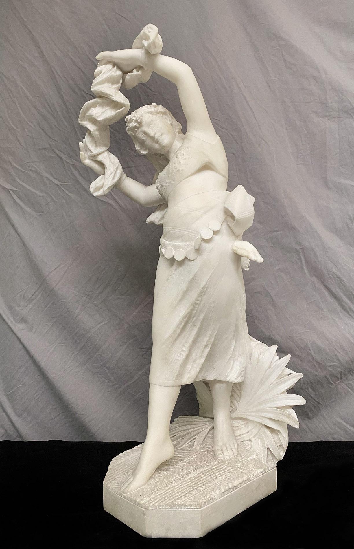 Wonderful early 20th century Italian Carrara marble figure of an exotic dancer by Ferdinando Vichi

The young girl wearing a jeweled bikini, her hair flowing around her shoulders in loose curls, dancing with a veil, her diaphanous skirt with