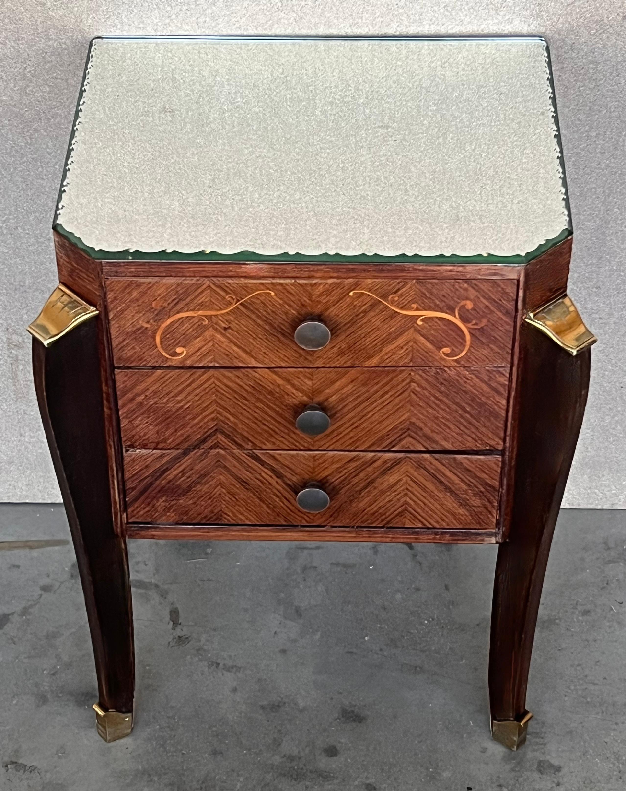 Fine pair of Italian neoclassical night stands or side tables, art deco styling, exude luxurious style from every angle! 
The polished nightstands with gorgeous marquetry drawers fronts creating exquisite patterns . 
 Fluted black ebonized columns