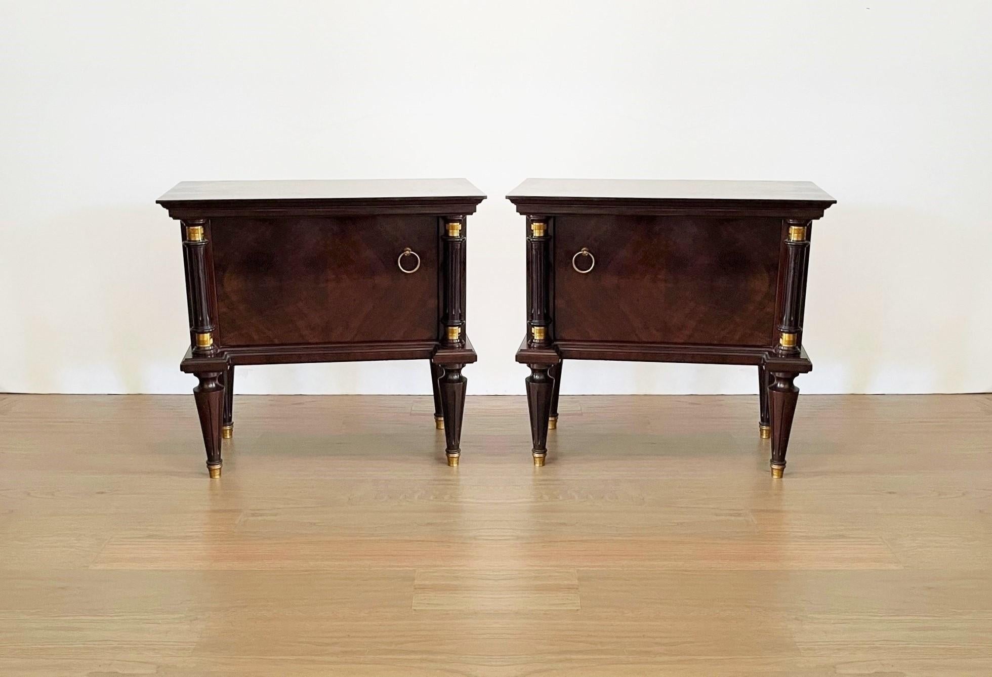 Fine pair of Italian neoclassical night stands or side tables, art deco styling, exude luxurious style from every angle! The polished nightstands with gorgeous book-matched flame mahogany door fronts creating exquisite patterns that opens to a