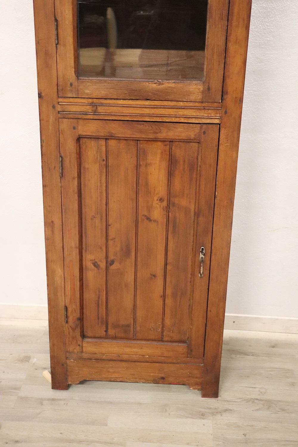 arched bookcase with glass doors