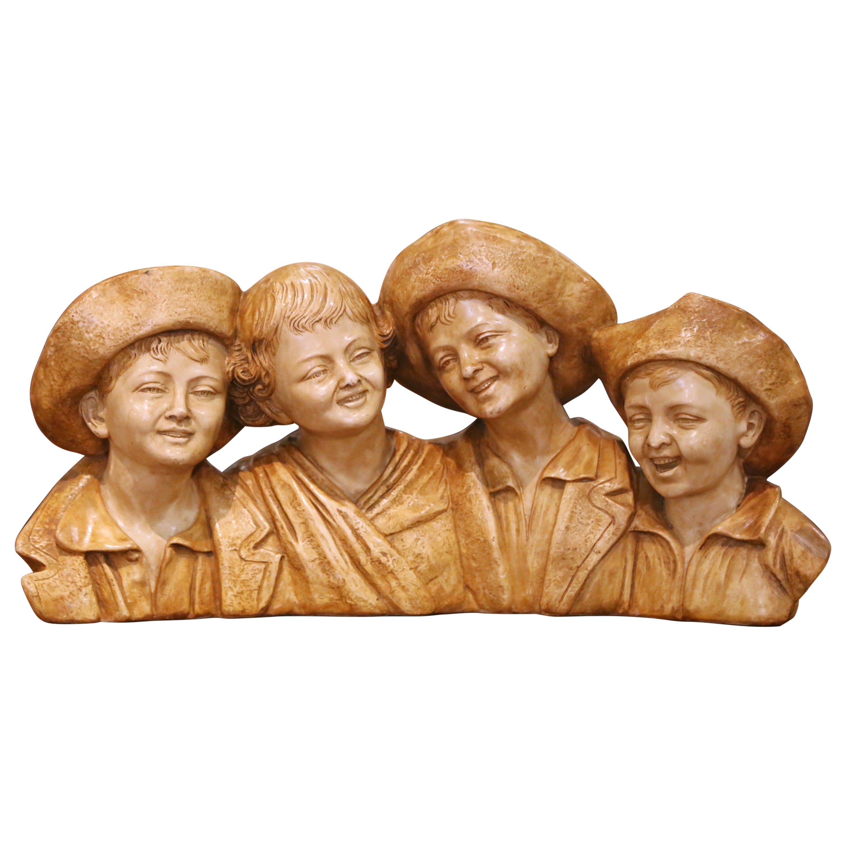 Scultura in terracotta italiana dei primi del Novecento con quattro ragazzi di S. Melani
