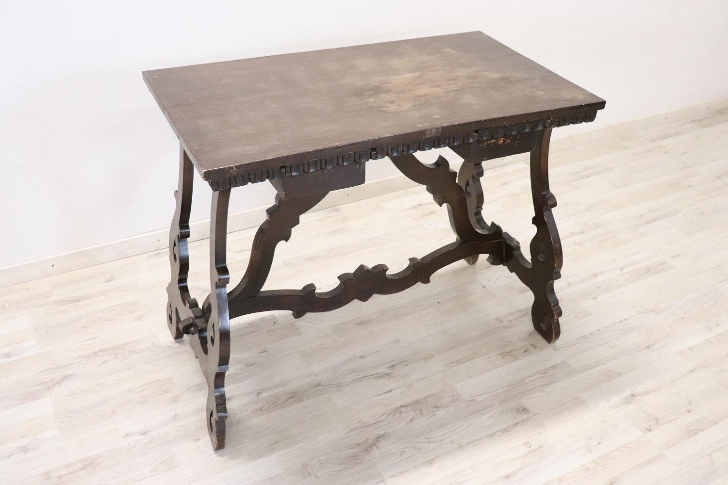 Beautiful early 20th century solid walnut table in renaissance style. This type of table in Italy was called 