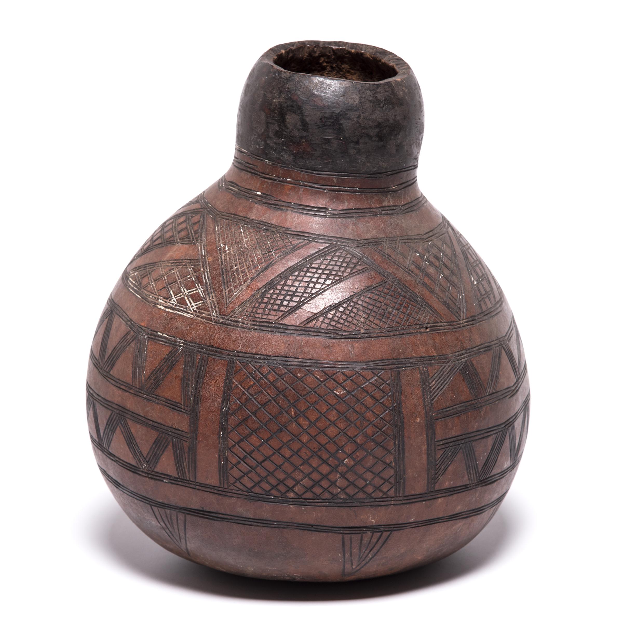 Tribal Early 20th Century Ivorian Nupe Incised Gourd Drinking Vessel