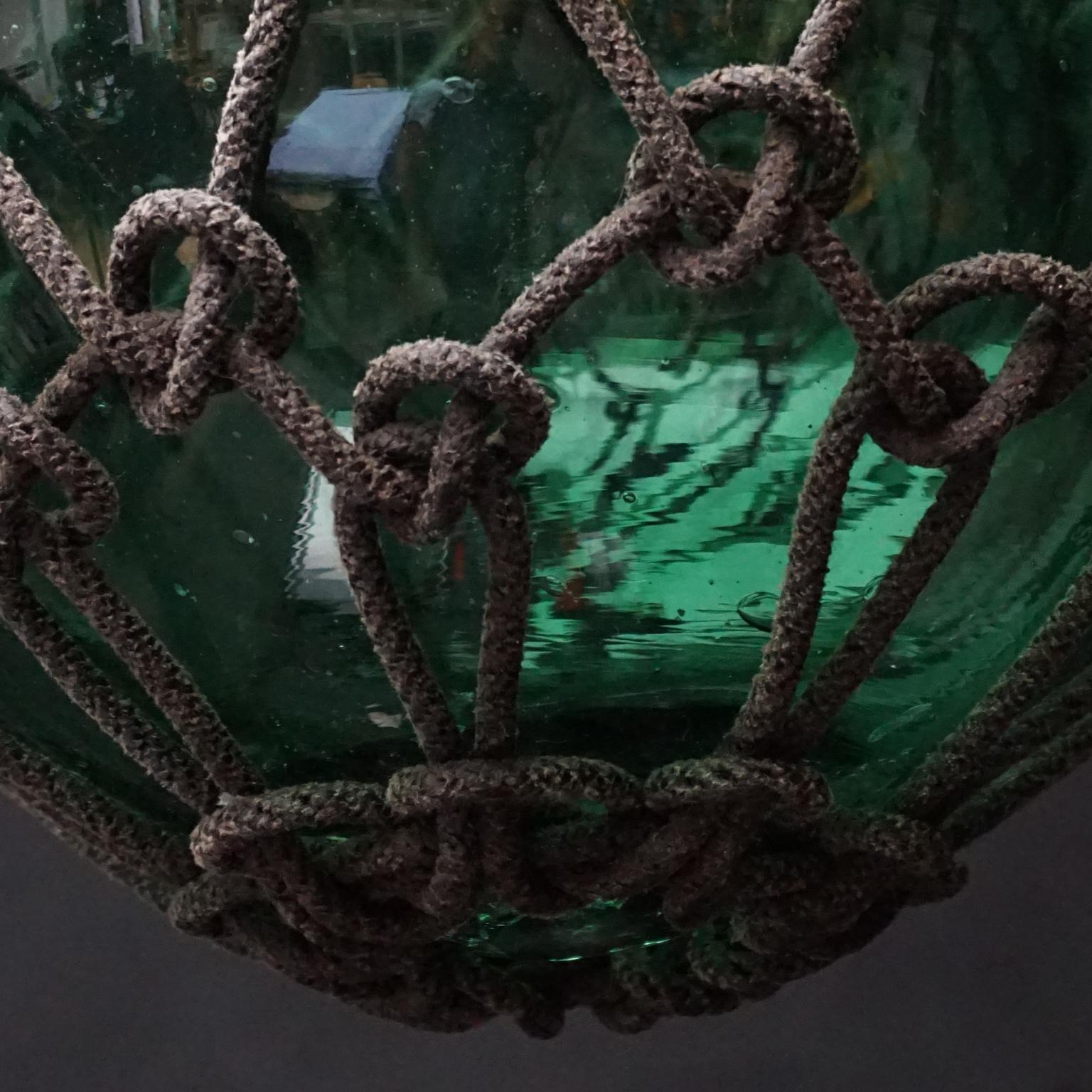 Early 20th Century Japanese Green Glass Fishing Float in Tied Knotted Ropes 8