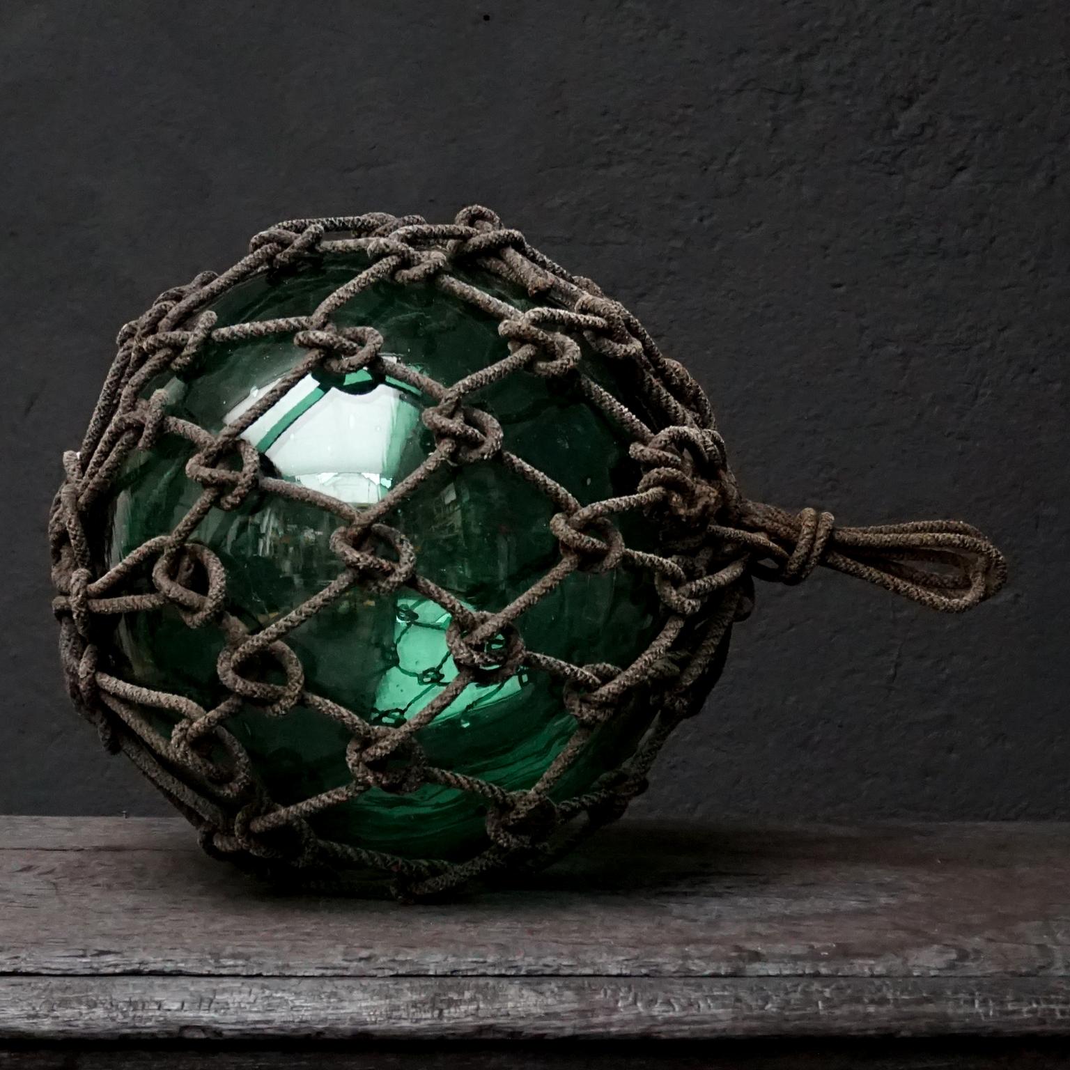 Early 20th Century Japanese Green Glass Fishing Float in Tied Knotted Ropes 1