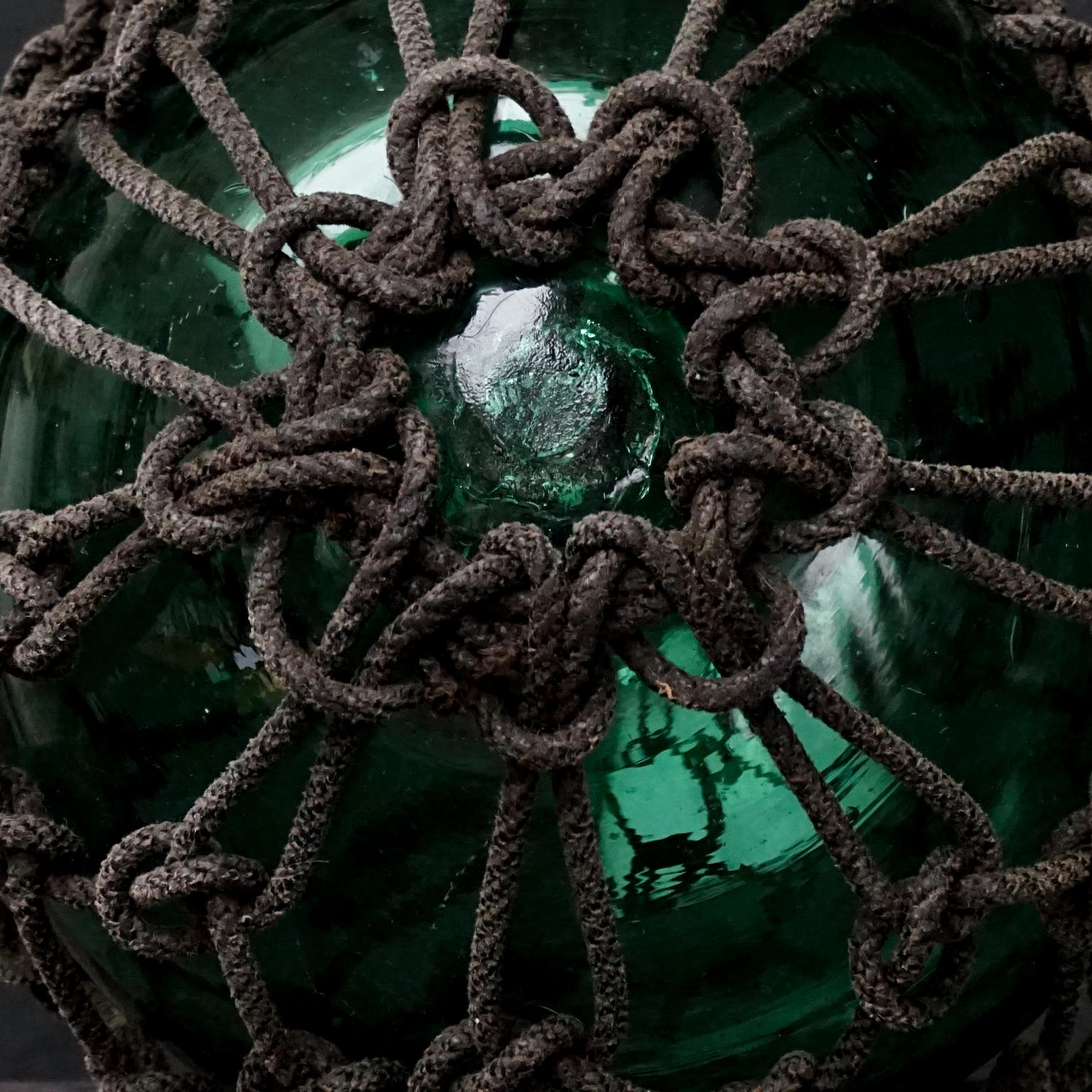 Early 20th Century Japanese Green Glass Fishing Float in Tied Knotted Ropes 3