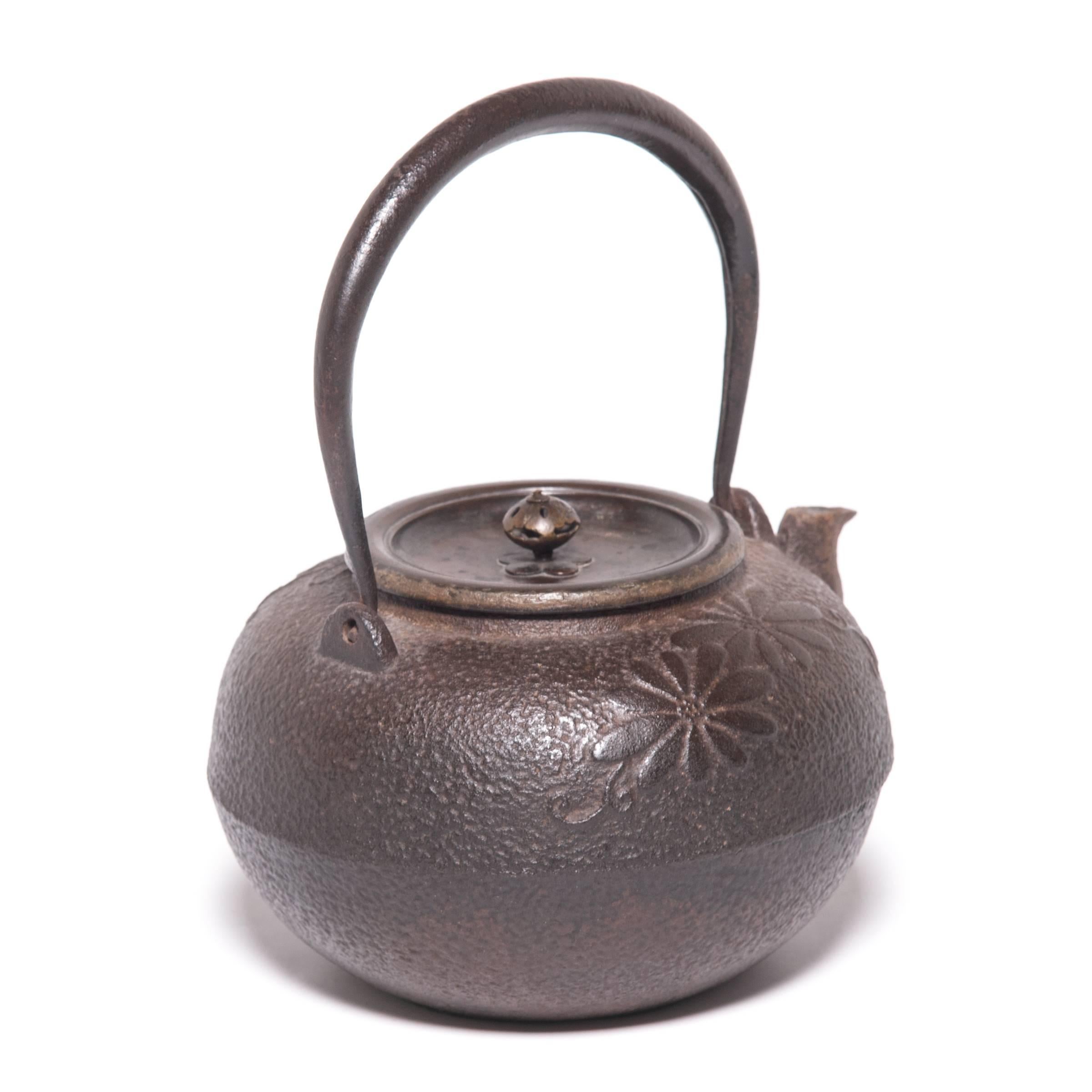 20th Century Japanese Iron Tetsubin with Chrysanthemum Blossoms, c. 1900 For Sale