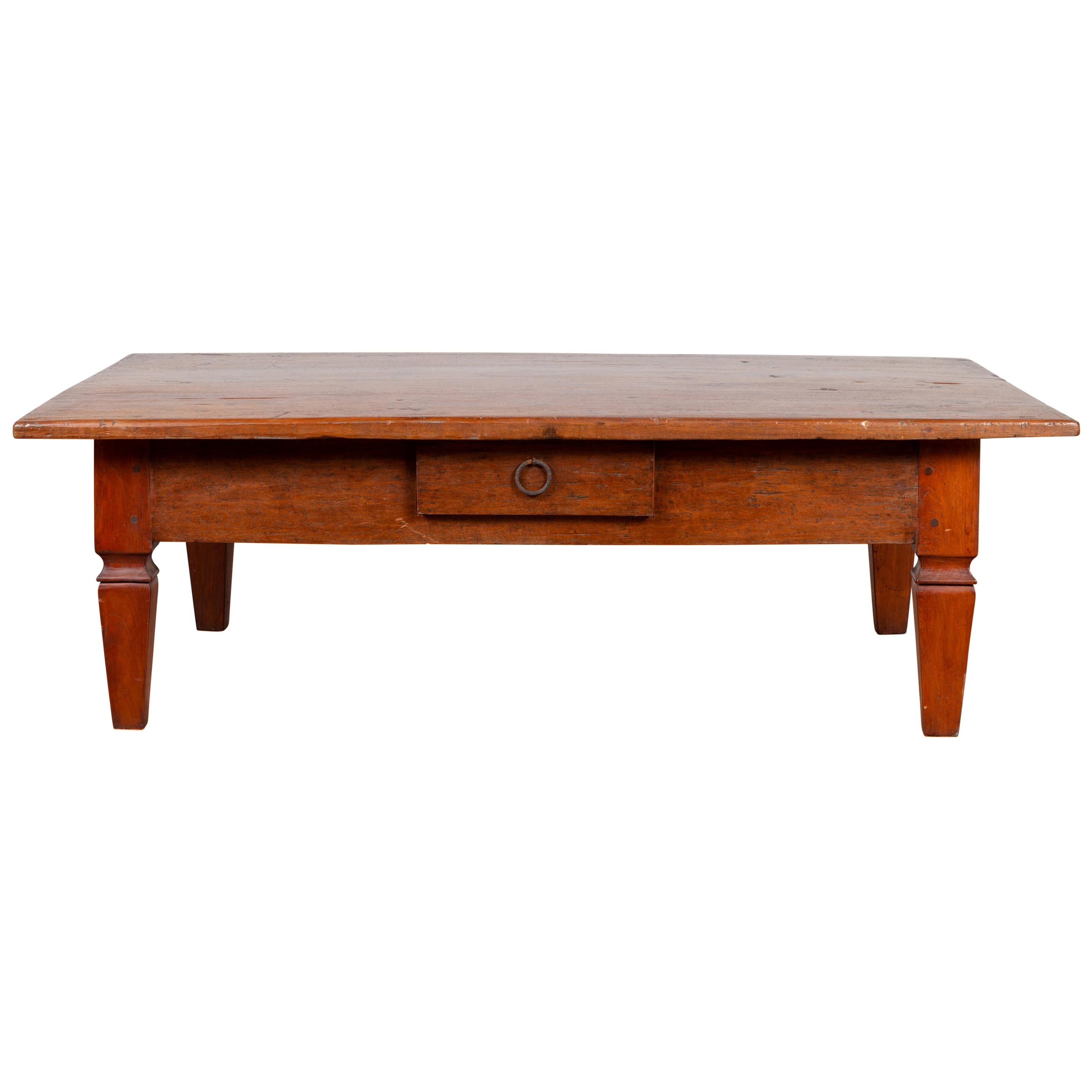 Early 20th Century Javanese Coffee Table with Single Drawer and Tapered Legs