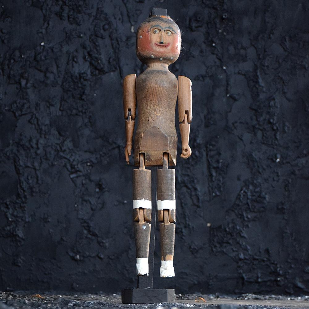 Early 20th century Jigger Doll “Norman”

We are proud to offer a charming early 20th century hand carved English articulated jigger doll, whom we have lovely names Norman. Norman is made from pine, with shell buttons for eyes, various metal