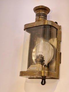 Early 20th century kerosene bulkhead lamp/lantern in brass, detachable burner.