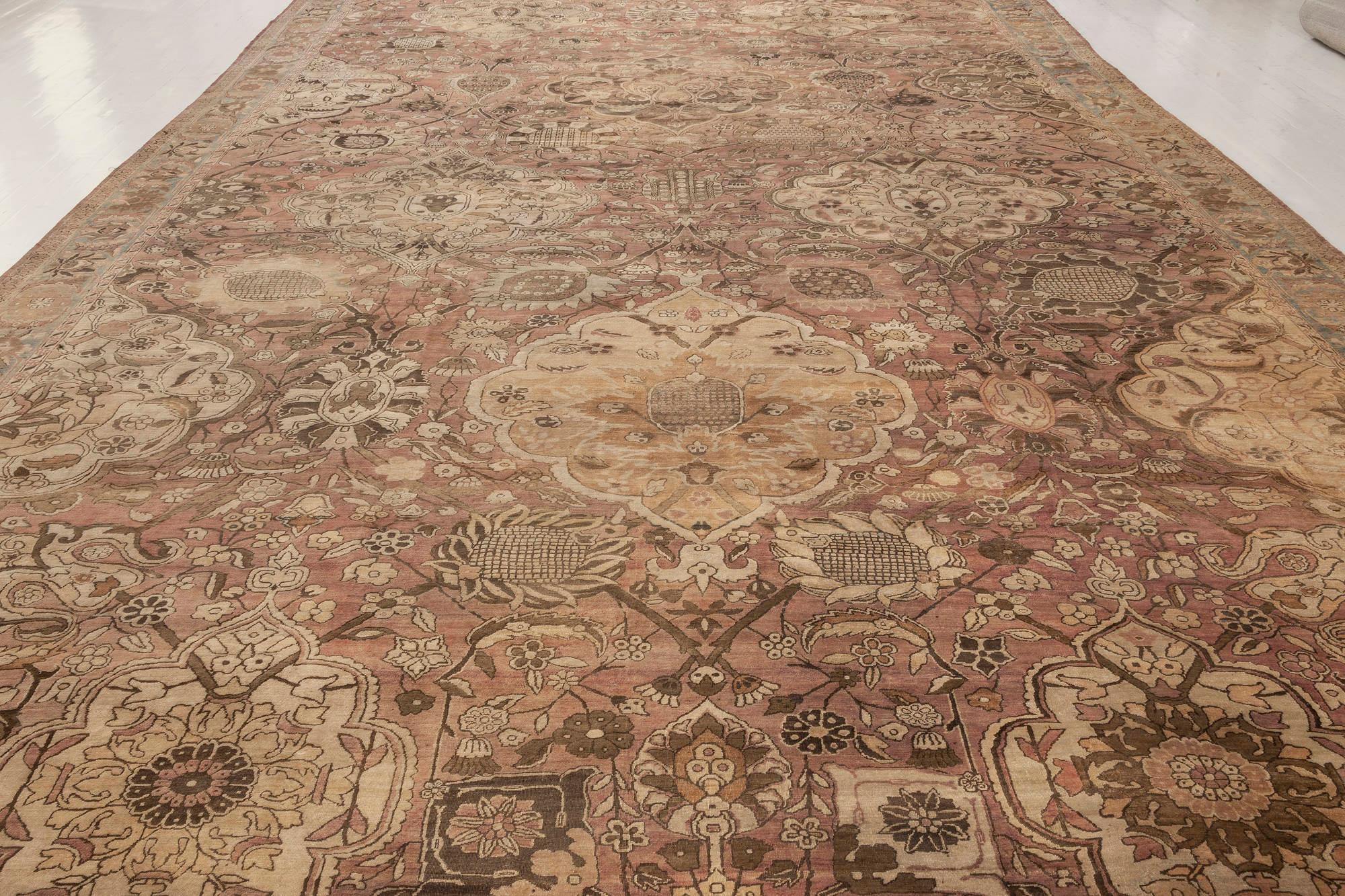Early 20th century Kirman rug in beige, blue, brown, pink
Size: 11'7