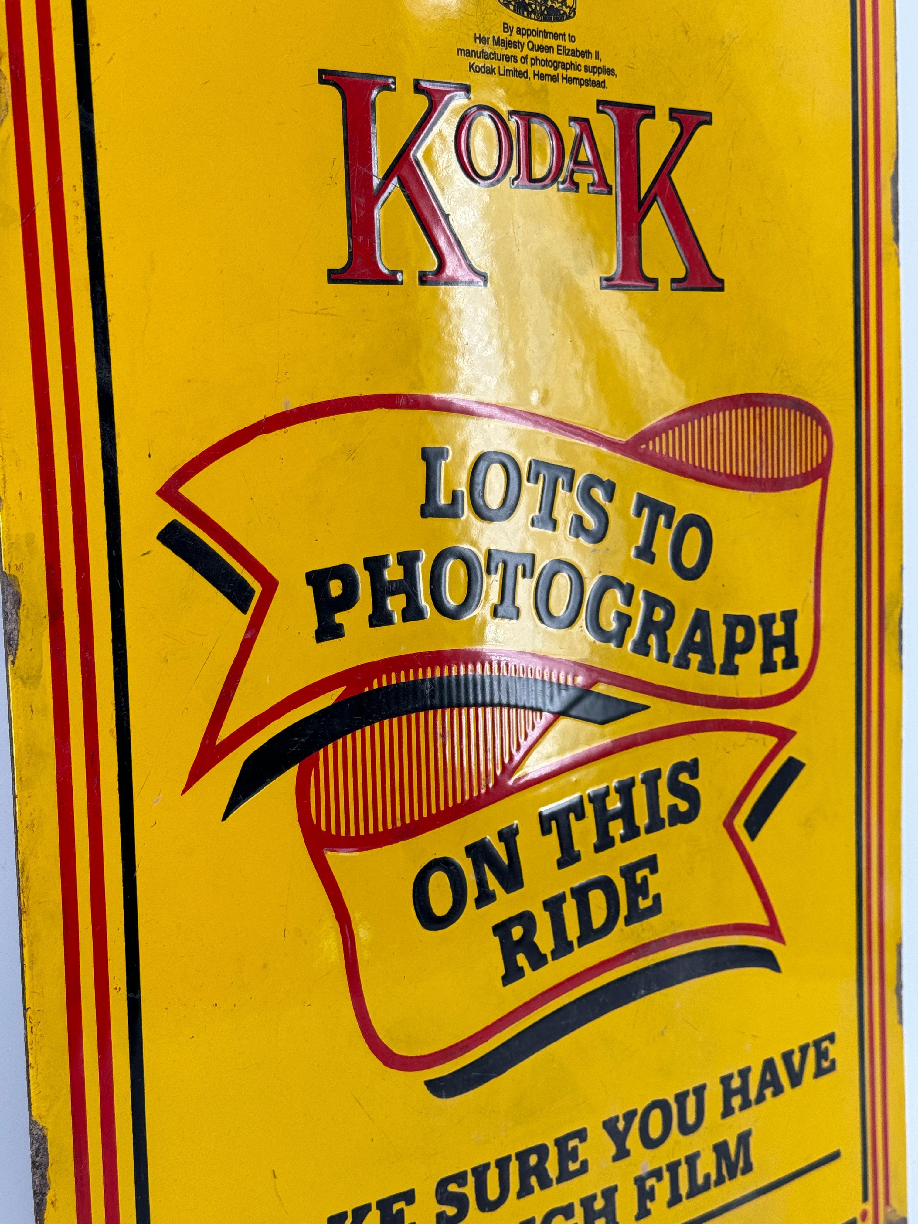 This antique Kodak advertising sign is made of thick enamel in black, yellow and red. 
The colours are bright and shiny, with a nice relief. 
The condition is fairly good considering its age, dating from early XXth century.
This advertising sign was