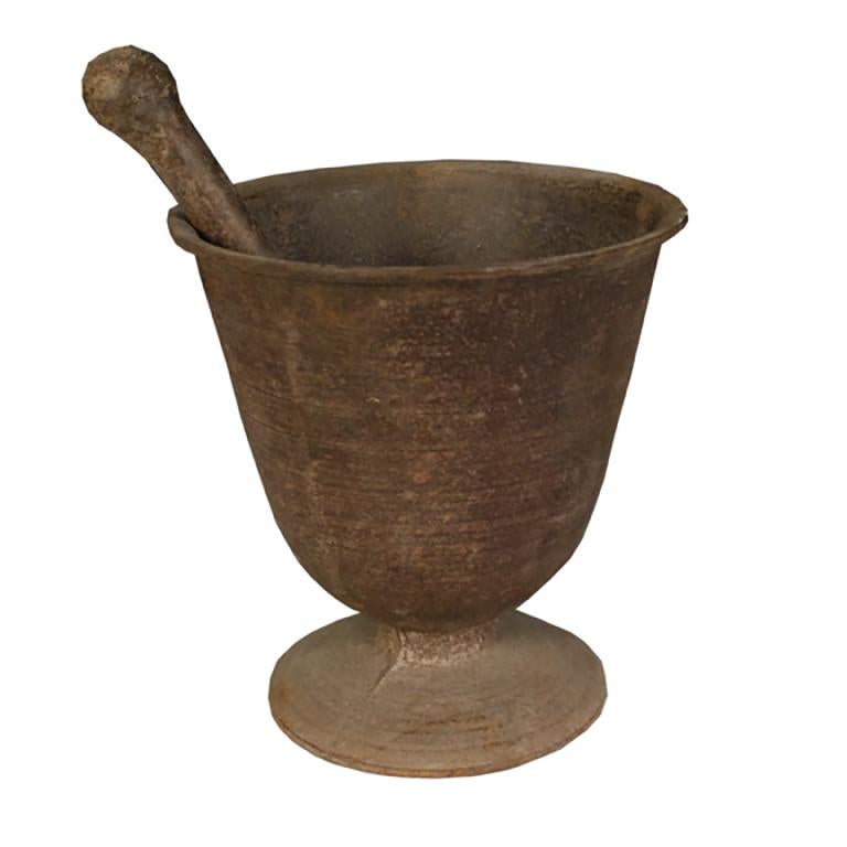 Since ancient times, apothecaries around the world have been using mortar and pestles like this one to grind medicinal herbs. This finely crafted and sculptural vessel was cast in iron in the early 1900s and would have been indispensable to a Korean
