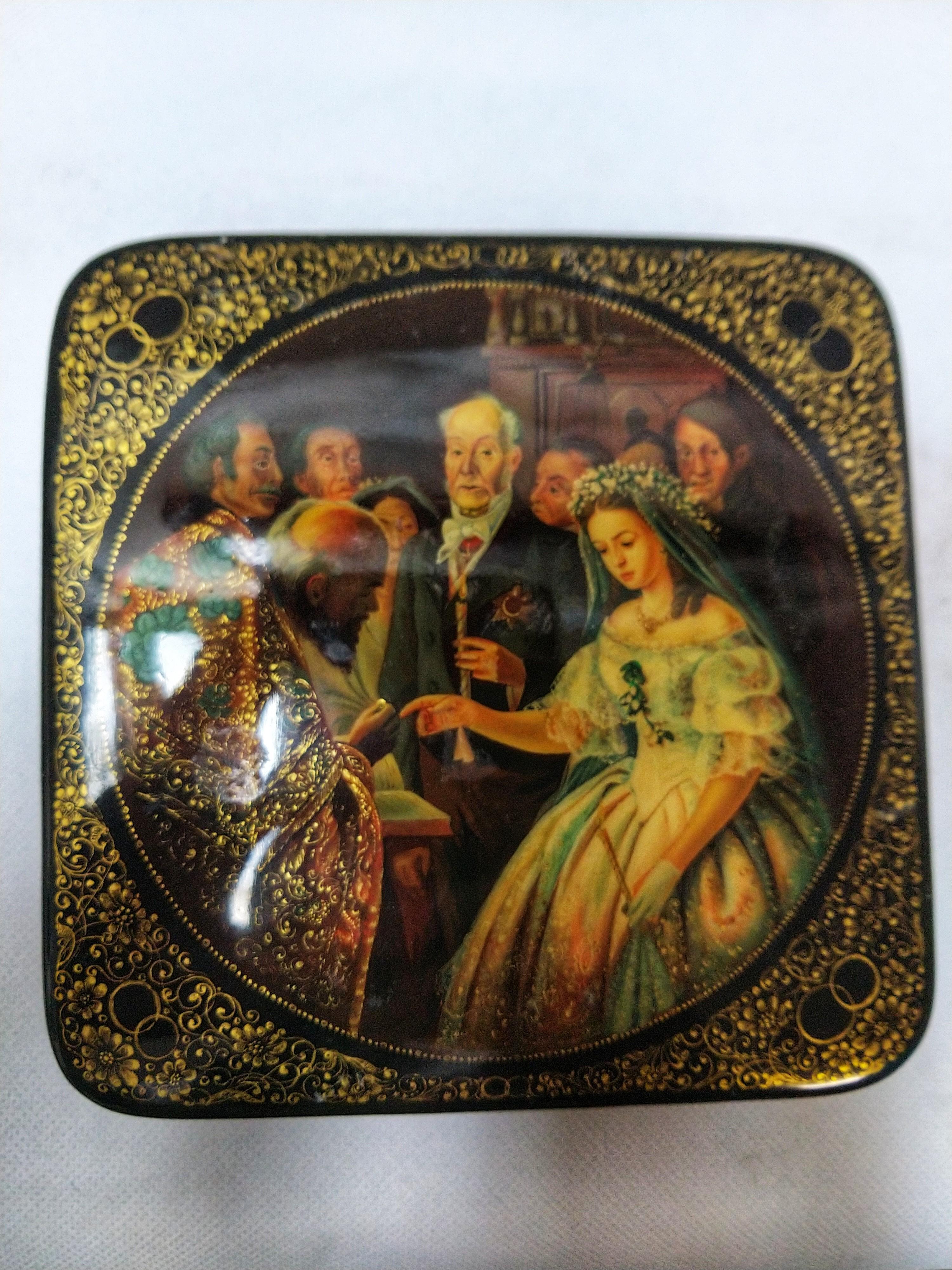 Exceptional lacquered and hand-painted Russian box. 
The painting depicts a sad young woman (probably due to a forced marriage with an older man). Note the fabulous colors.

These hand-painted miniatures have an ancient and multi-secular