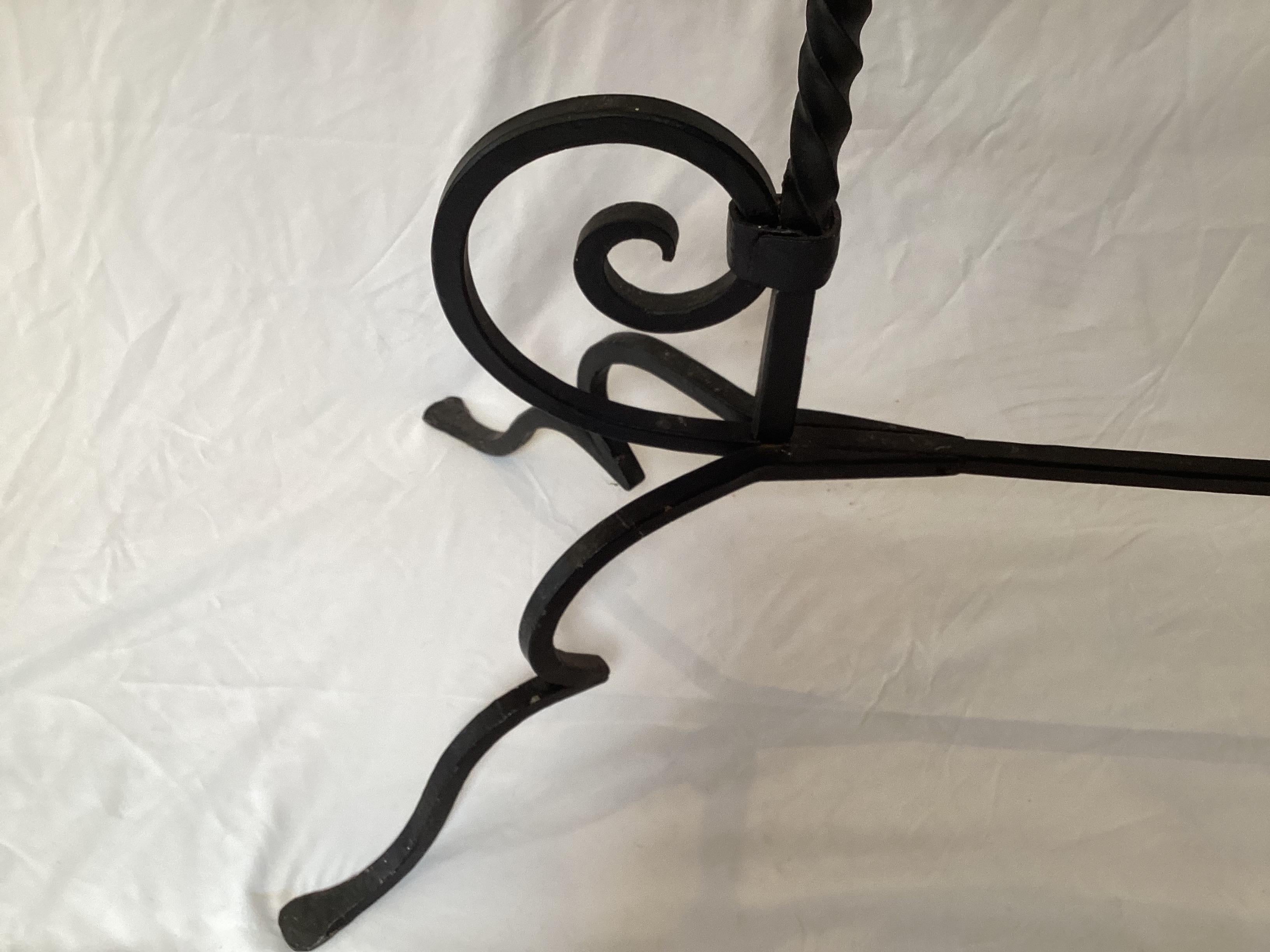 Large Black Wrought Iron Plant Stand or Candle Holder Holds 6 Plants or Candles. Great for indoor and outdoor use. 42” wide by 14” deep by 34” tall. Each dish will hold a 4 1/2” pot. Great condition with minor age-appropriate wear.