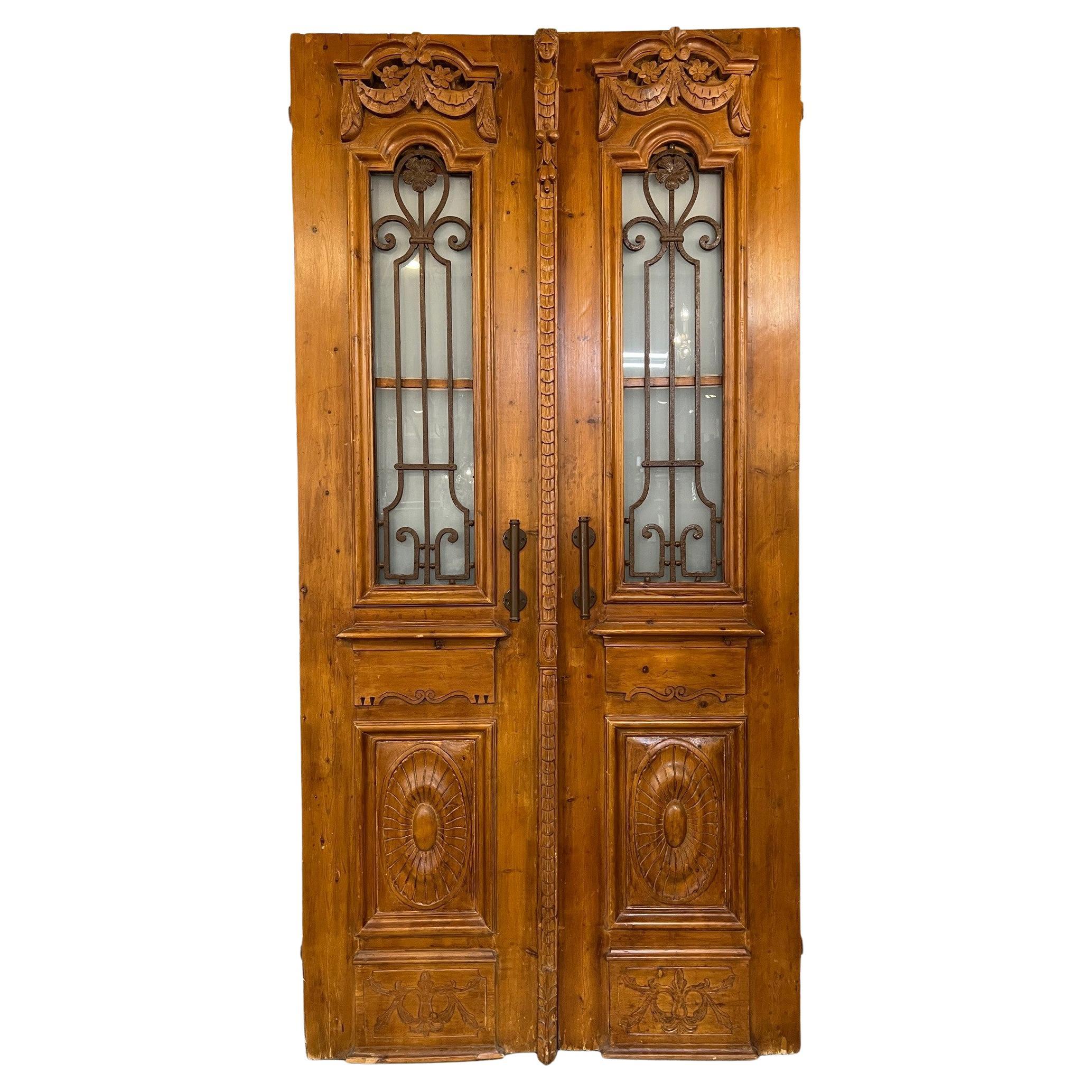 Early 20th Century Large Pair of Antique Egyptian Doors with Iron Panels For Sale
