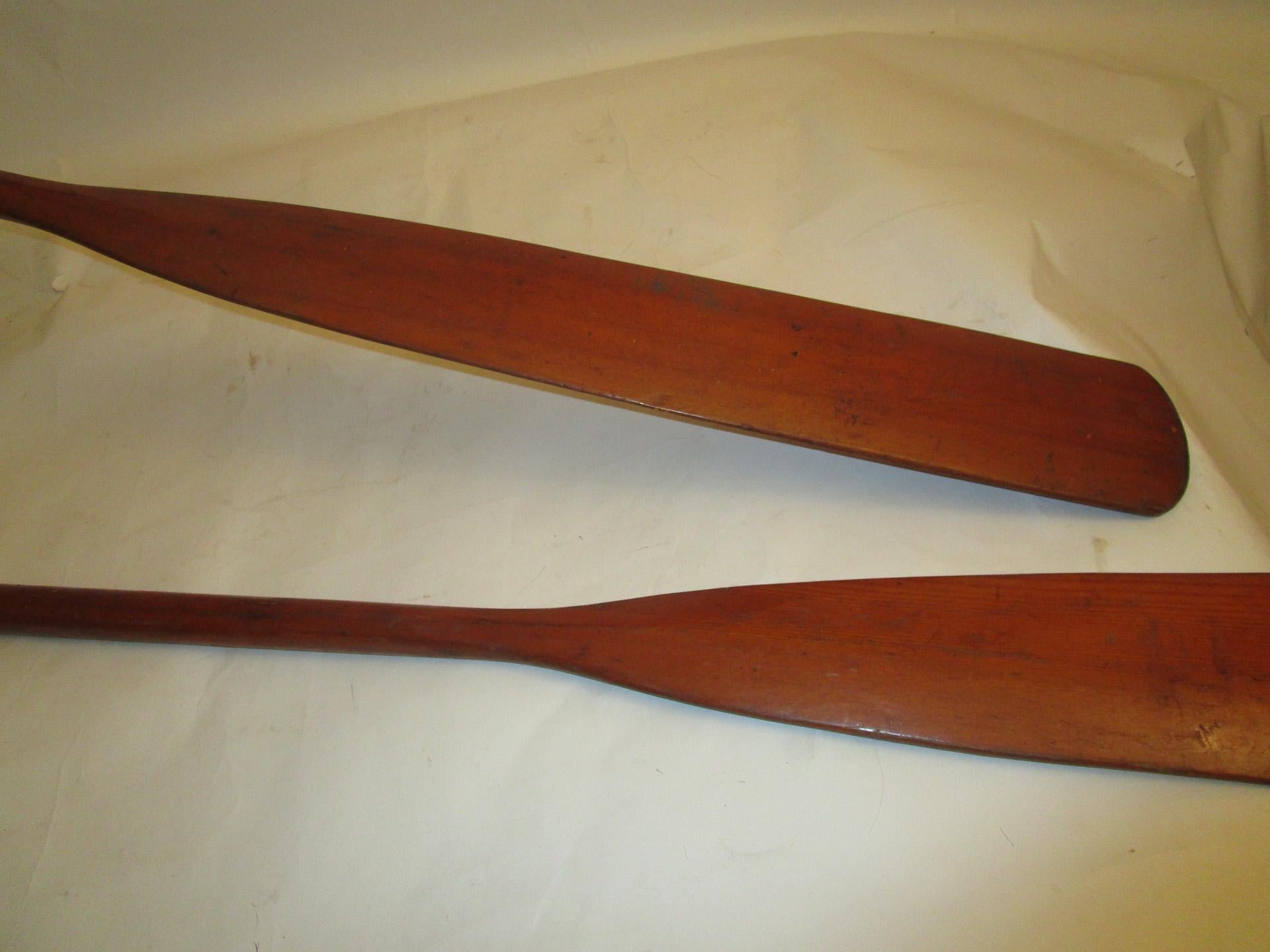 American Early 20th century Large Size Pair of Wooden Rowboat Oars with Leather Sleeves 
