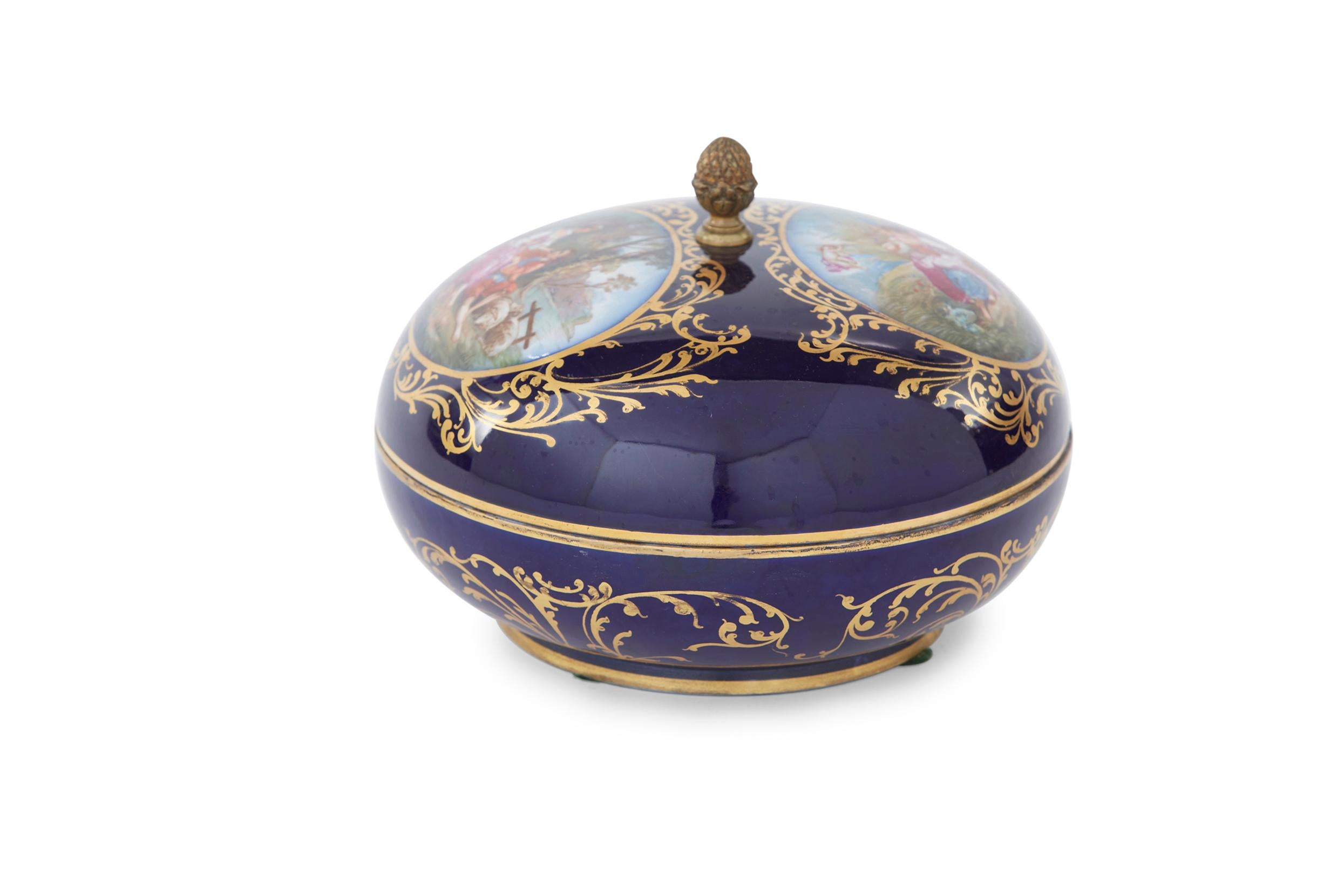 Early 20th century large Limoges porcelain covered vanity Box. Valny Limoges Chateau De Tuileries with interior floral & exterior scenes design details. The covered vanity box is in great condition. Minor wear consistent with age / use. Maker's mark