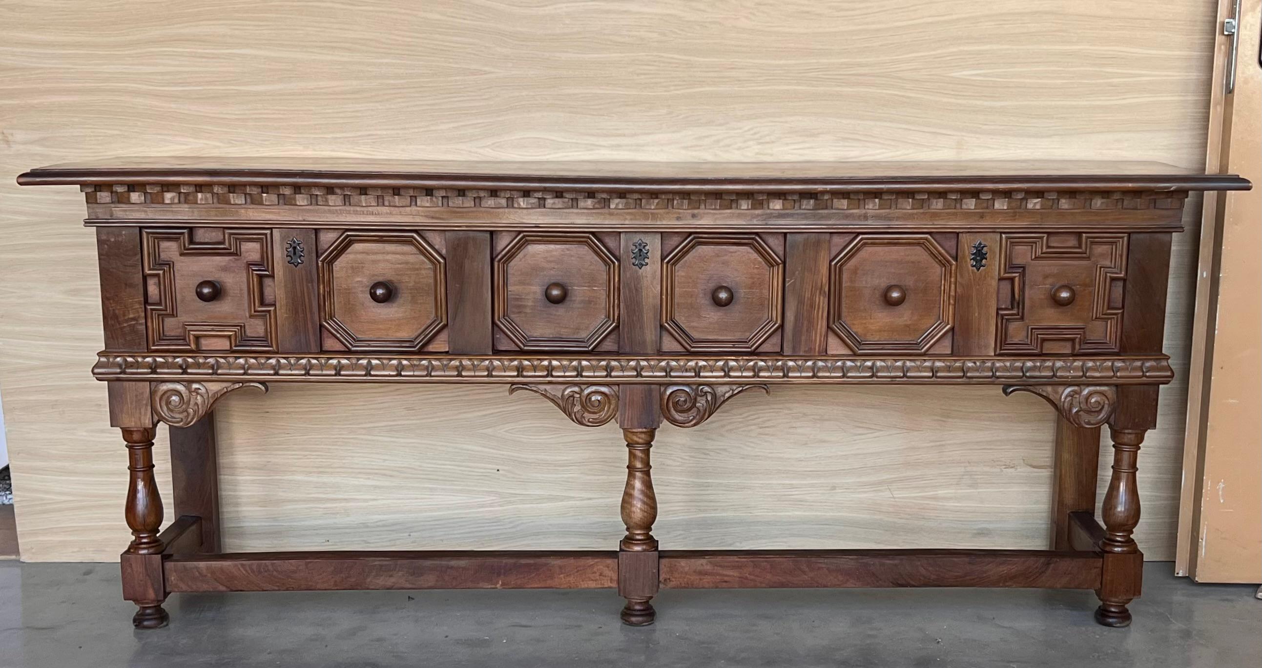 Unique piece 20th century Spanish refectory table with carved drawers and moldings. Two iron pulls in each drawer

Completely restored.

