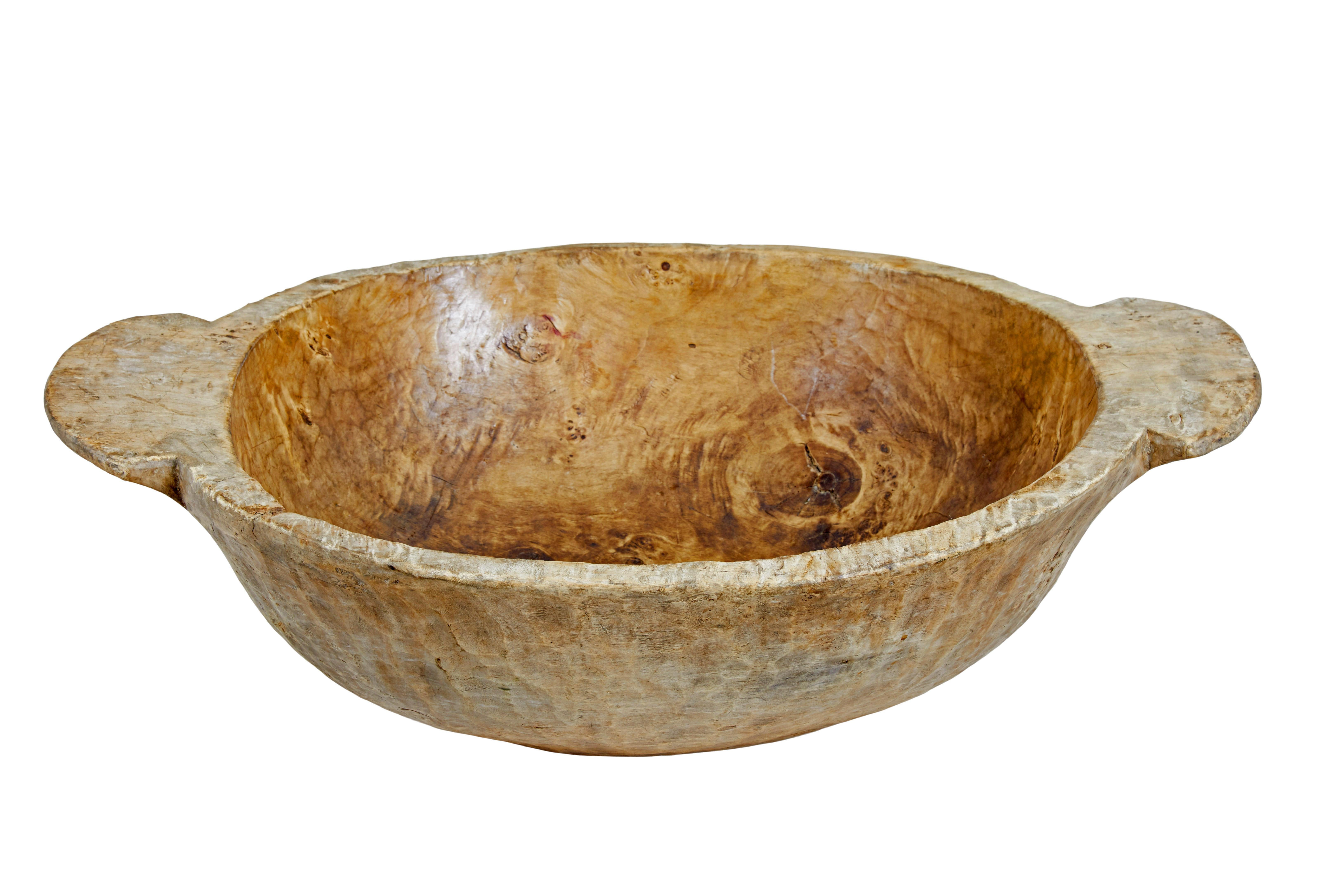 Early 20th century large wooden bowl circa 1900.

Here we offer a large wooden bowl which would have been used to feed livestock in eastern europe at the beginning of the 1900's.   We have re-conditioned the bowl with a polished interior and a