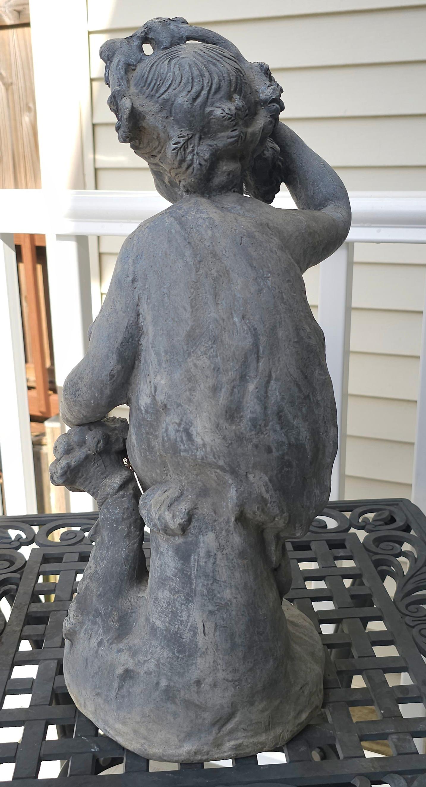 Oggetti in metallo Statua in piombo di Cherubino delle Four Seasons dei primi del Novecento in vendita