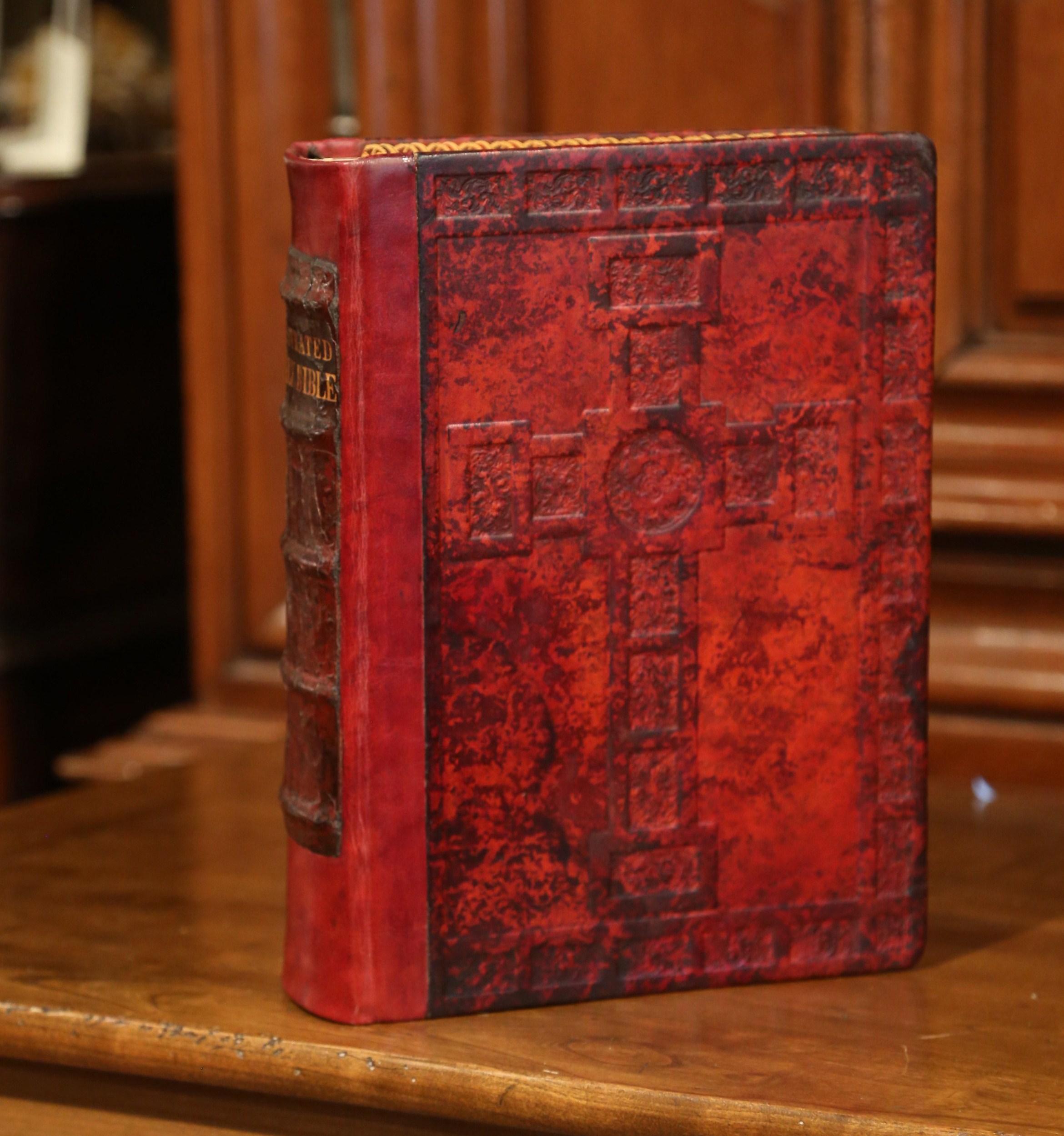 This beautiful antique Bible was printed in Sweden and distributed by Gothic Press Incorporated in New York. Printed circa 1930, the illustrated family Bible King James version with old and new testament, features a red leather hardback with gold