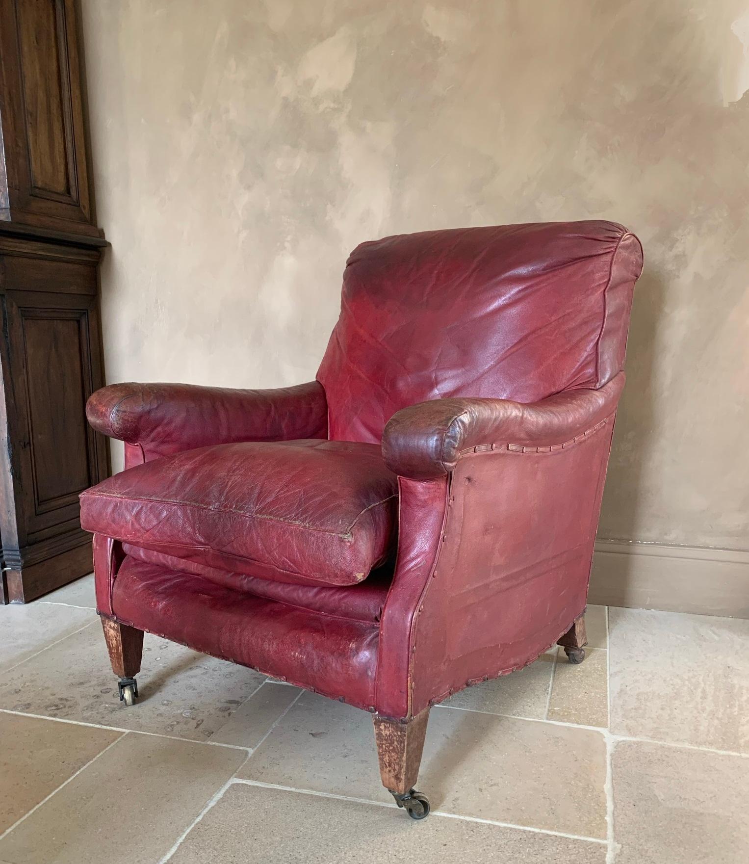 A great leather clubchair. We preserved the beautiful patina of this chair while restoring the springs and bands to ensure comfort. The burgundy red leather was waxed.