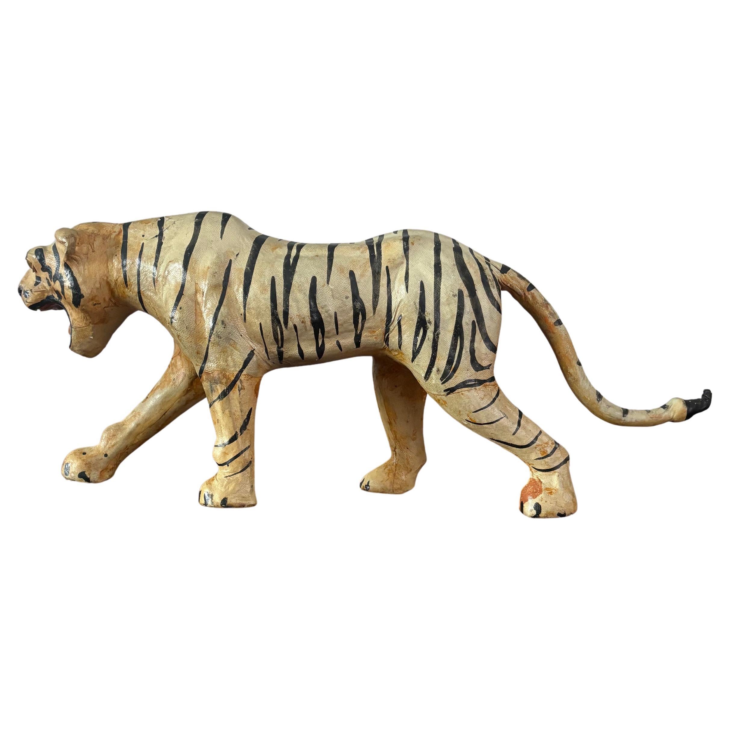 Hand crafted leather tiger sculpture. Likely Anglo Indian period after the turn of the century. Meticulously hand painted however the orange has faded. 

Light wear. 

