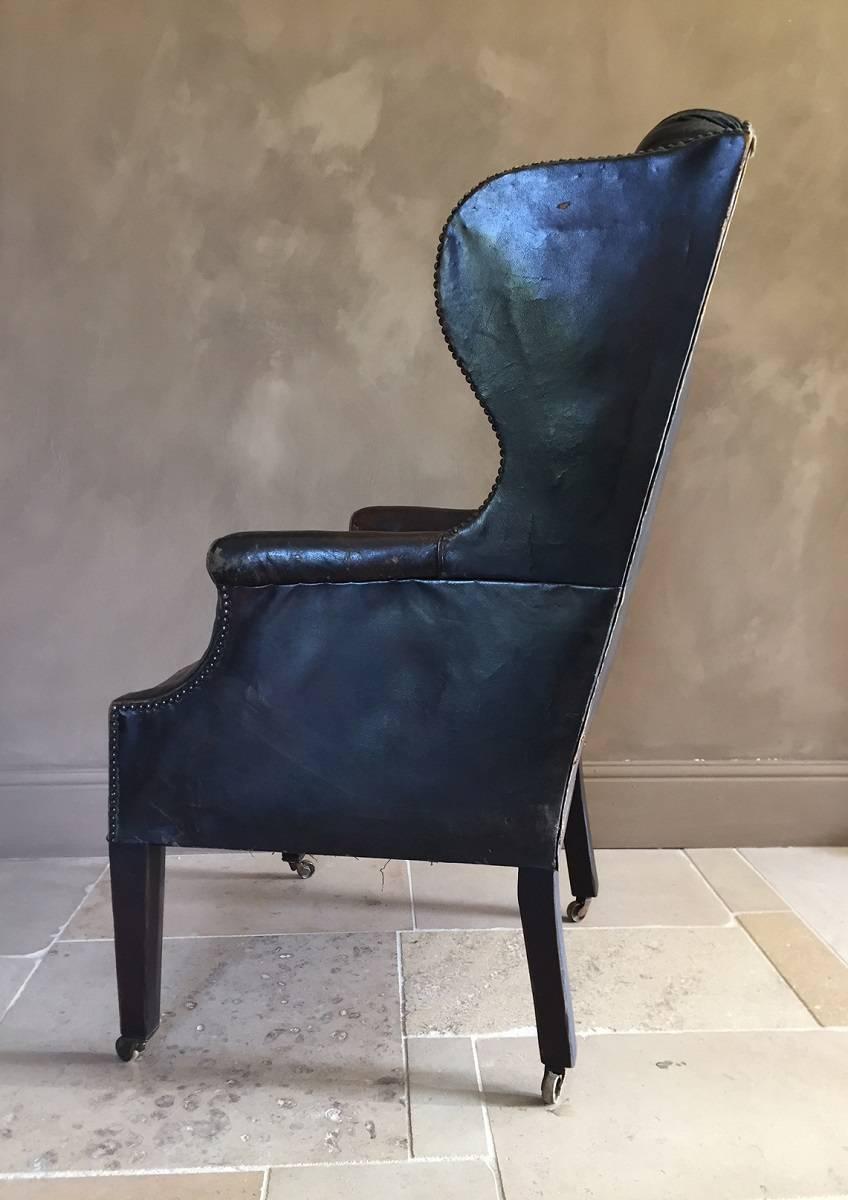 Early 20th Century Leather Wingchair In Excellent Condition In Vosselaar, BE