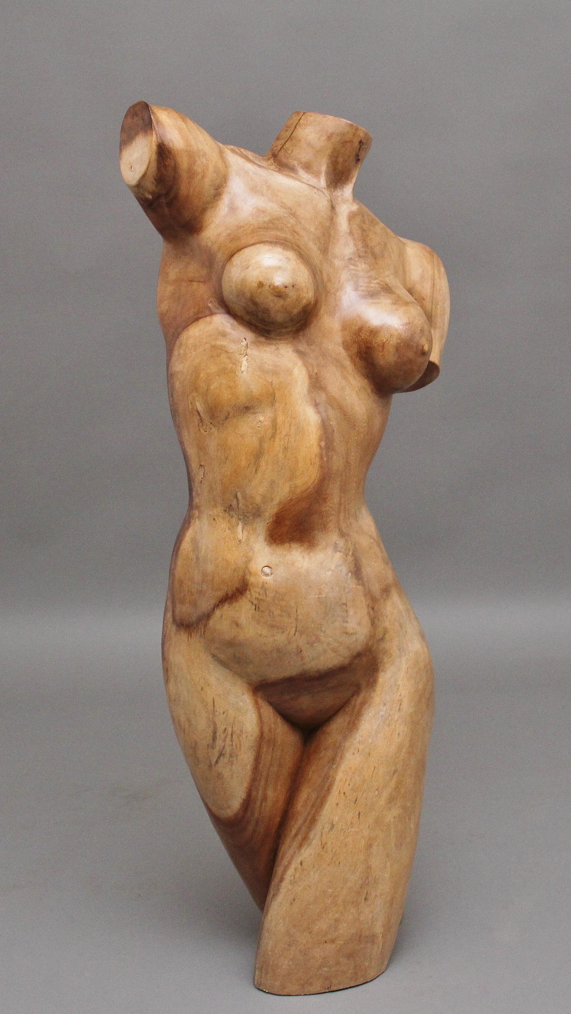 A fabulous quality Early 20th Century life size carved female torso in the classical style, very well executed in wonderfully figured walnut, the sculpture is in excellent condition and has a wonderful warm walnut colour, circa 1930.