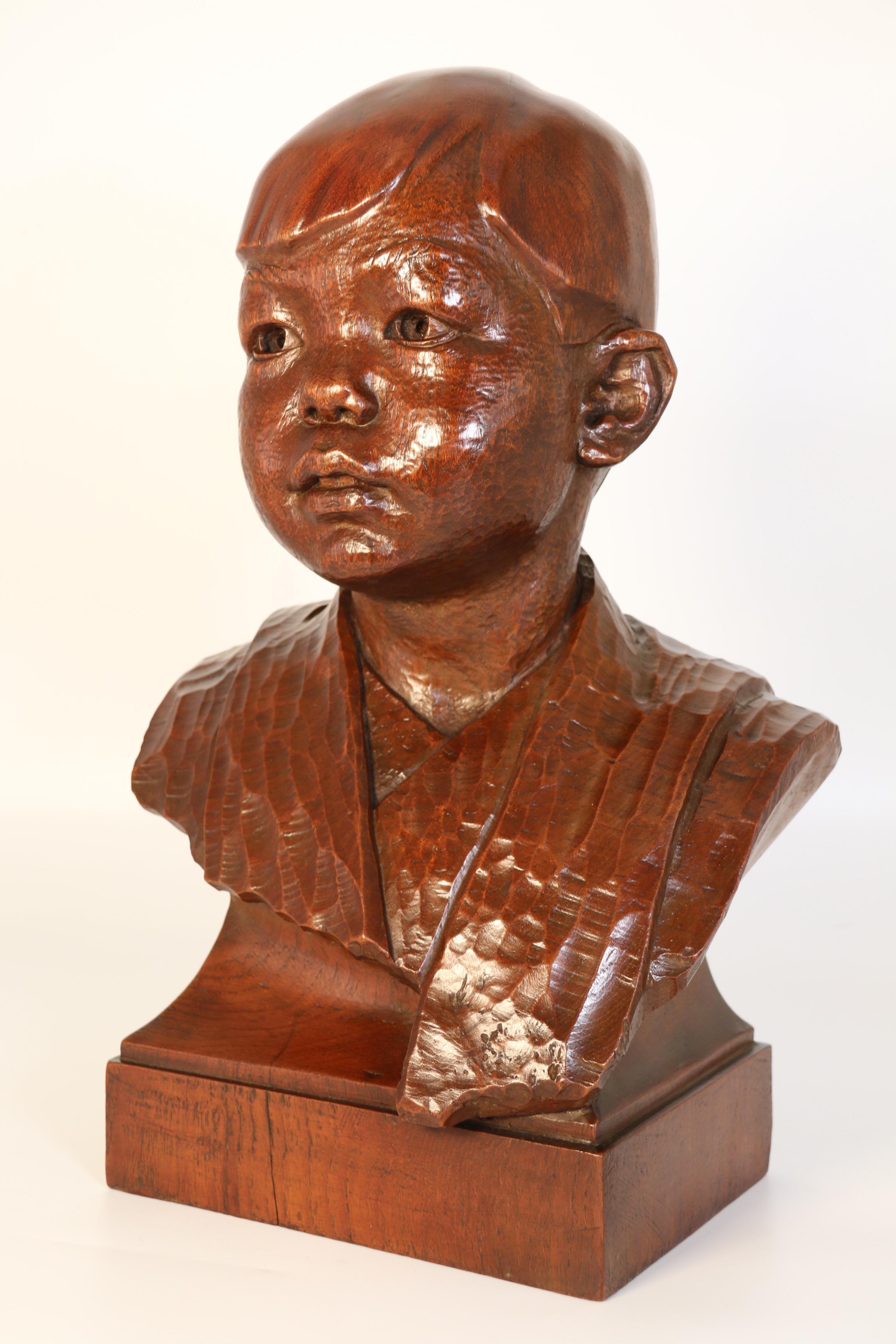 Scottish Early 20th century life size walnut bust of a boy by George Henry Paulin RBS For Sale