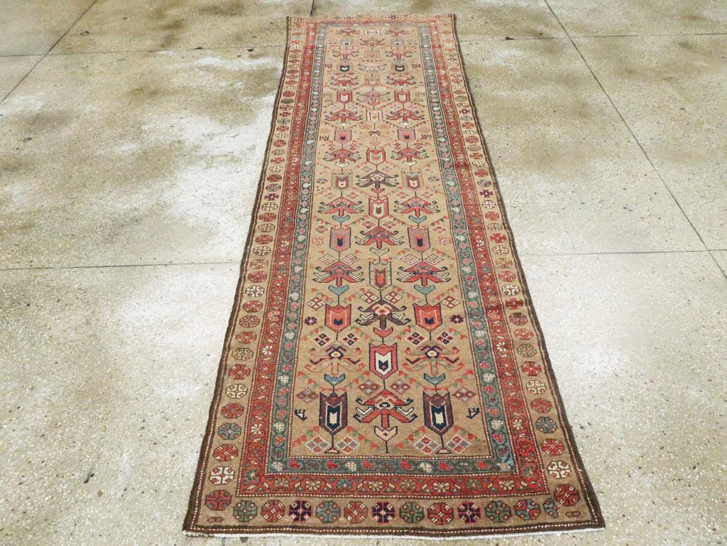 Early 20th Century Light Brown, Purple, Rust, and Blue Persian Tribal Runner In Good Condition In New York, NY