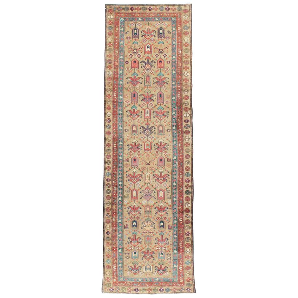 Early 20th Century Light Brown, Purple, Rust, and Blue Persian Tribal Runner