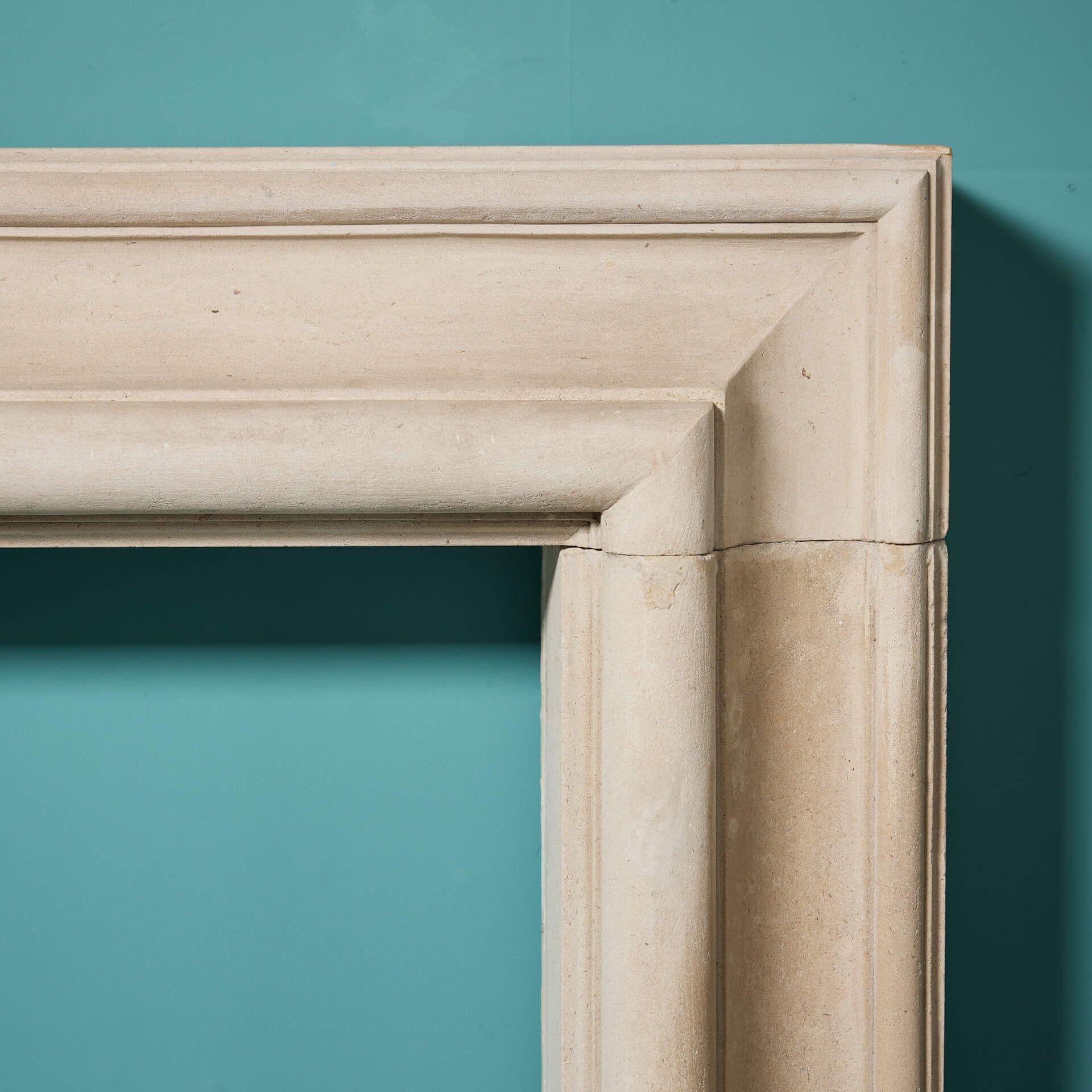 English Early 20th Century Limestone Bolection Fire Mantel For Sale