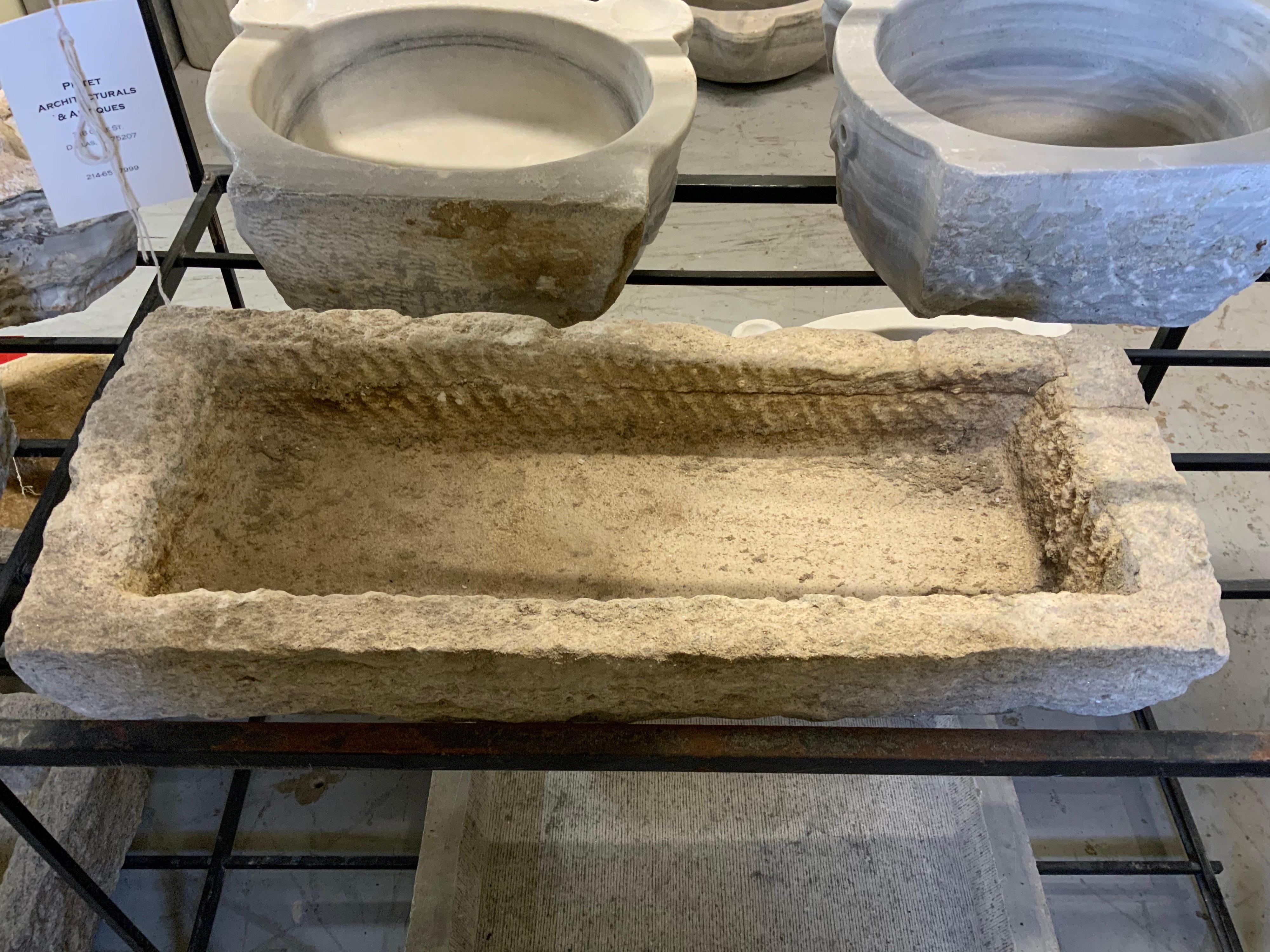This limestone sink origins from France, circa 1900.
