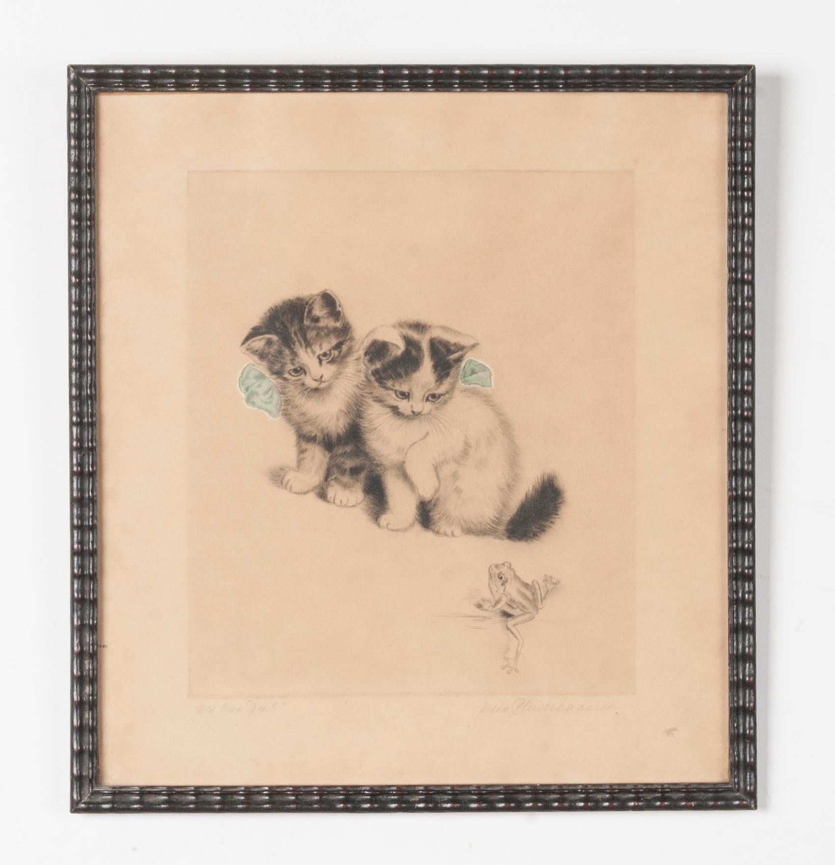 A cute lithograph of two kittens accompanied by a frog. Signed below with pencil by the artist: Meta Plückebaum. On the left the title 